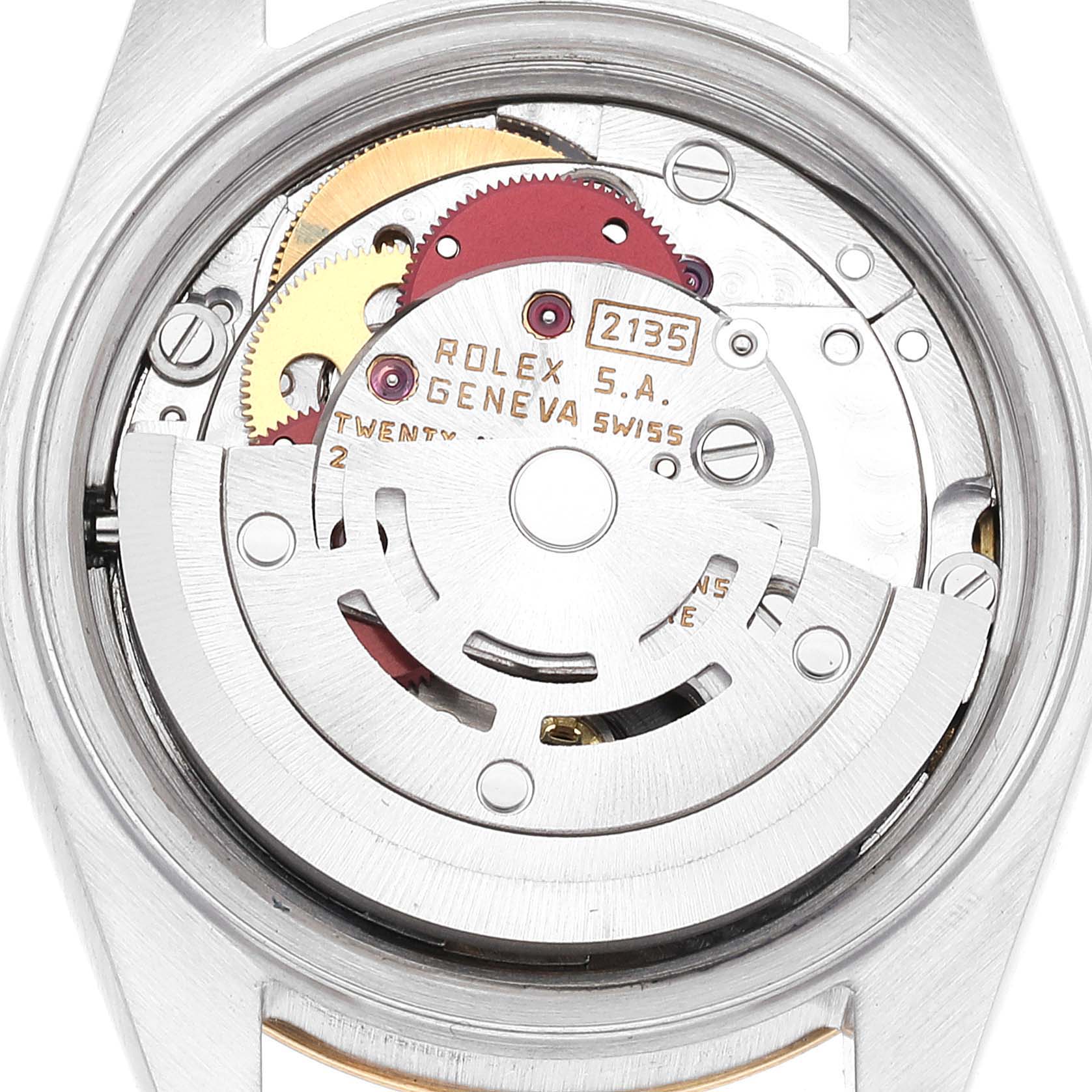 This image shows the movement mechanism of a Rolex Datejust 69173 Women's Steel and Gold (two tone) White Dial 69173 Women's Steel and Gold (two tone) White Dial watch from a back view, highlighting the intricate gears and components.