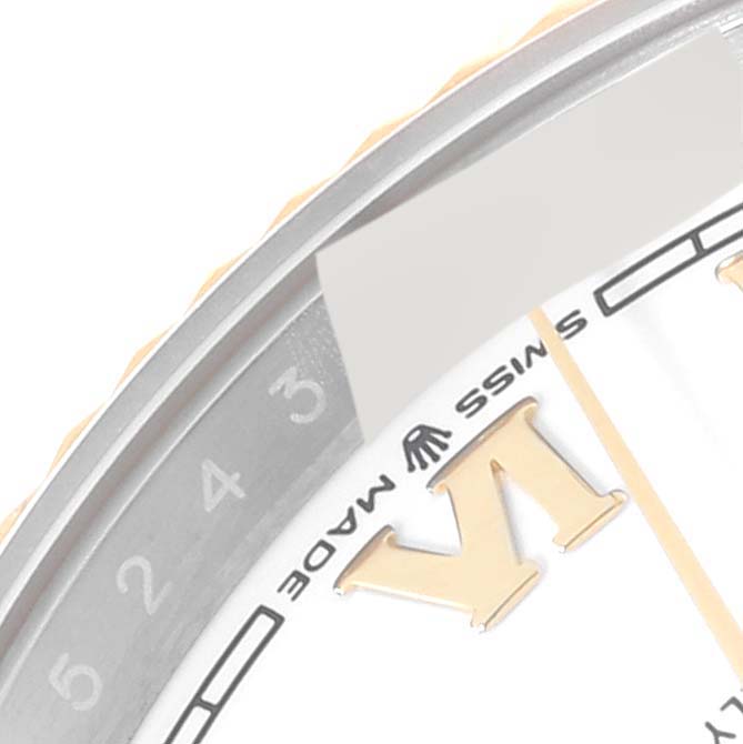 The image shows a close-up of the dial and part of the bezel of a Rolex Datejust 126233 Men's Steel and Gold (two tone) White Dial 126233 Men's Steel and Gold (two tone) White Dial watch.