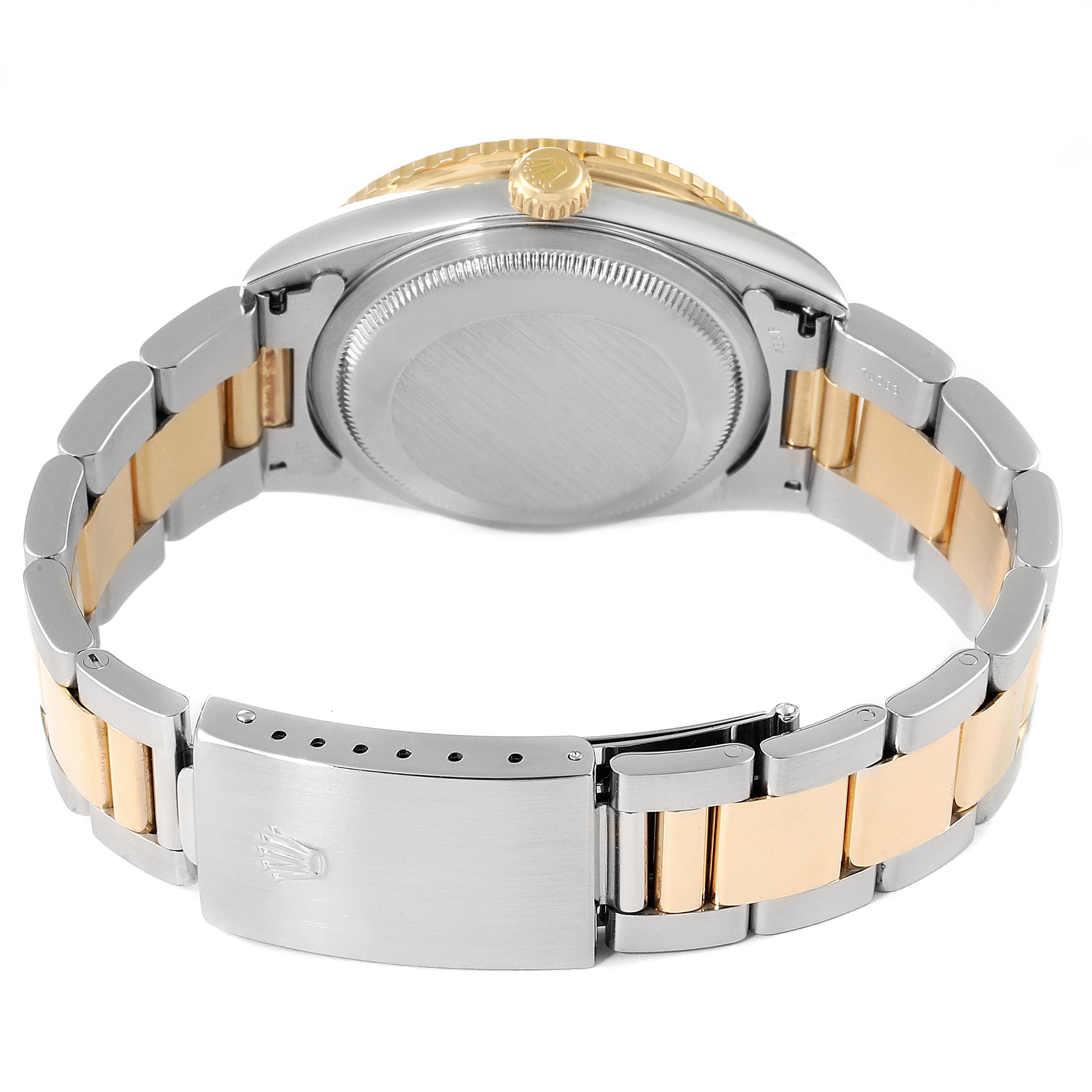This image shows the back and clasp of a Rolex Turn-o-Graph 16263 Men
s Steel and Gold (two tone) White Dial 16263 Men
s Steel and Gold (two tone) White Dial watch, highlighting its two-tone bracelet.
