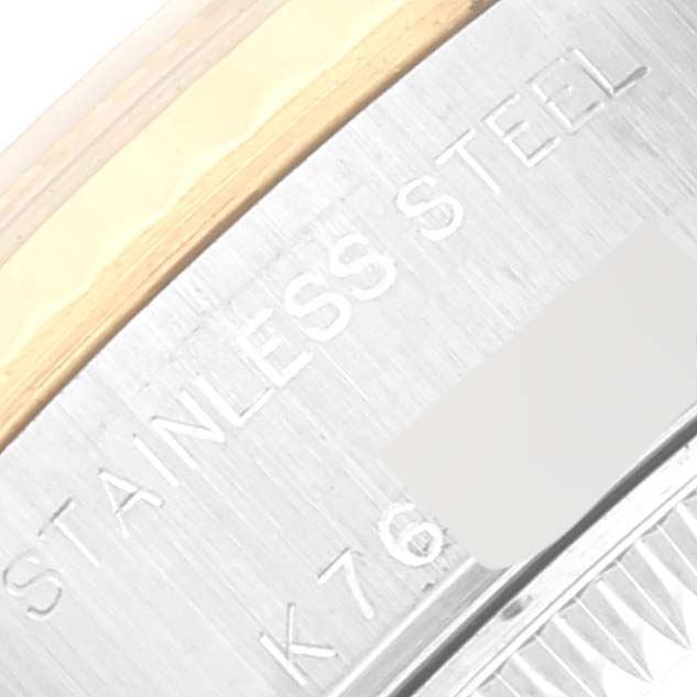 This image shows a close-up of the side of a Rolex Datejust 79173 Women's Steel and Gold (two tone) White Dial 79173 Women's Steel and Gold (two tone) White Dial watch, highlighting the stainless steel and gold parts.