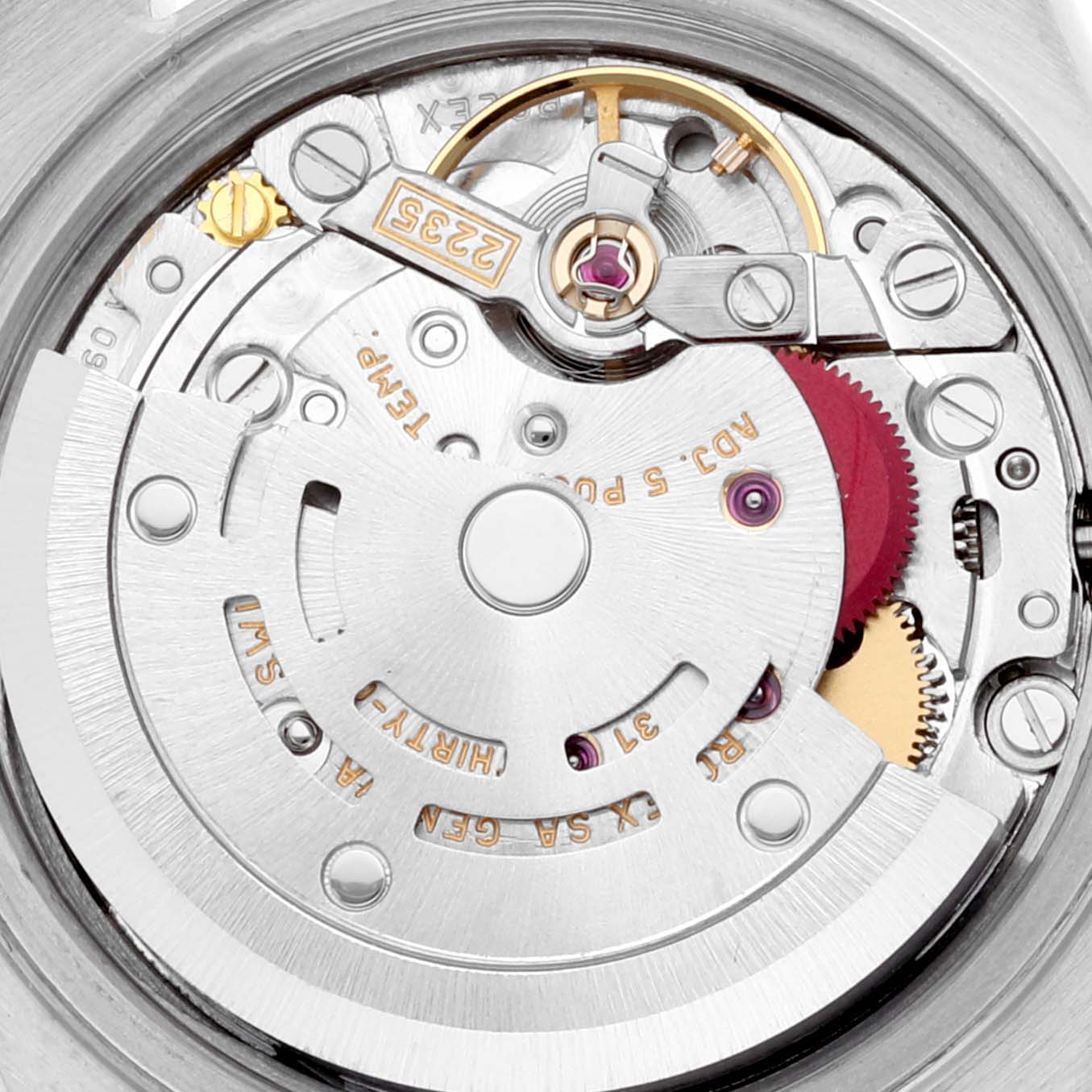 The image shows a close-up view of the movement inside a Rolex Datejust 79173 Women's Steel and Gold (two tone) White Dial 79173 Women's Steel and Gold (two tone) White Dial watch, highlighting gears and mechanical components.