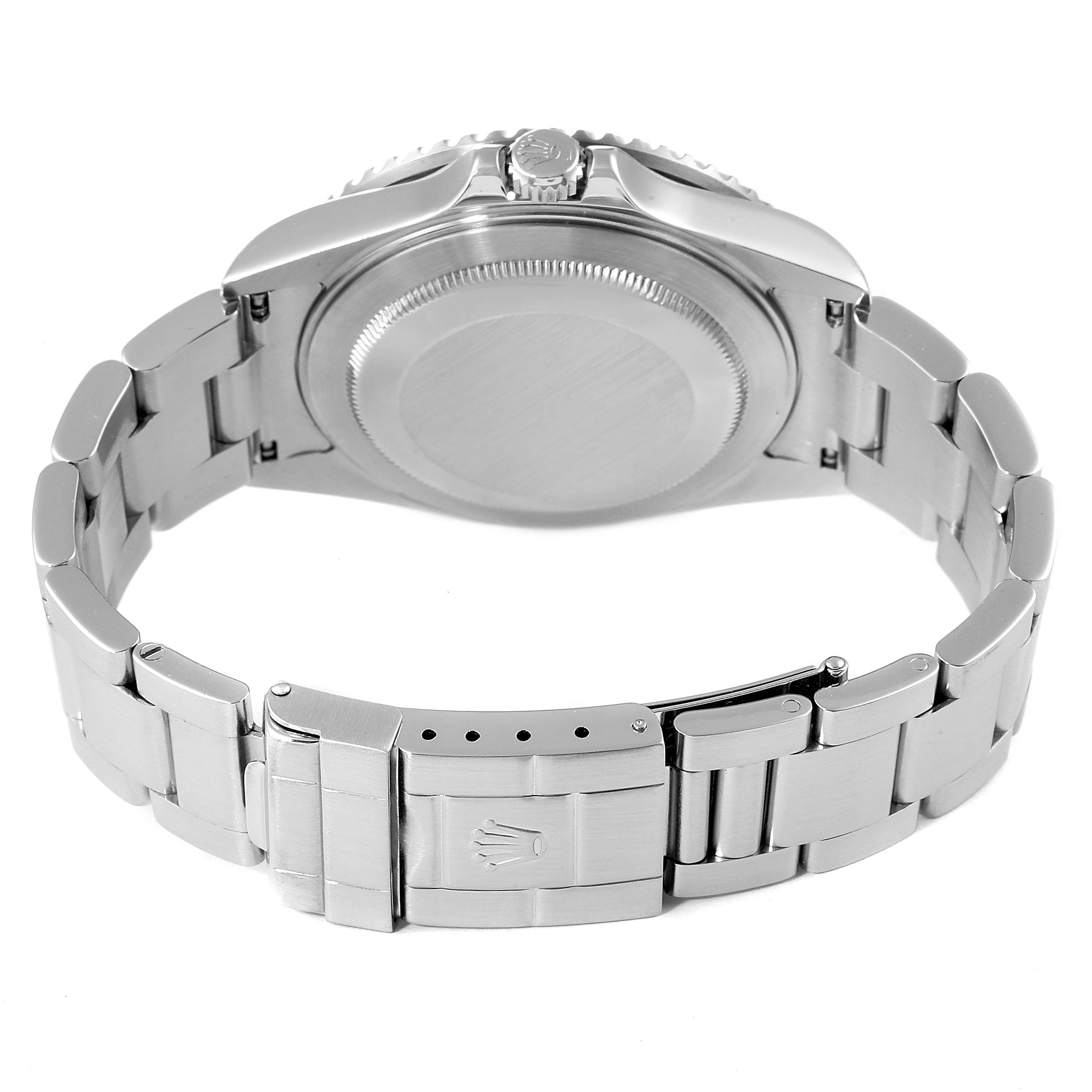 The image shows the back and the bracelet of a Rolex GMT-Master 16710 Men
s Stainless Steel Black Dial 16710 Men
s Stainless Steel Black Dial watch, highlighting its clasp and case back.