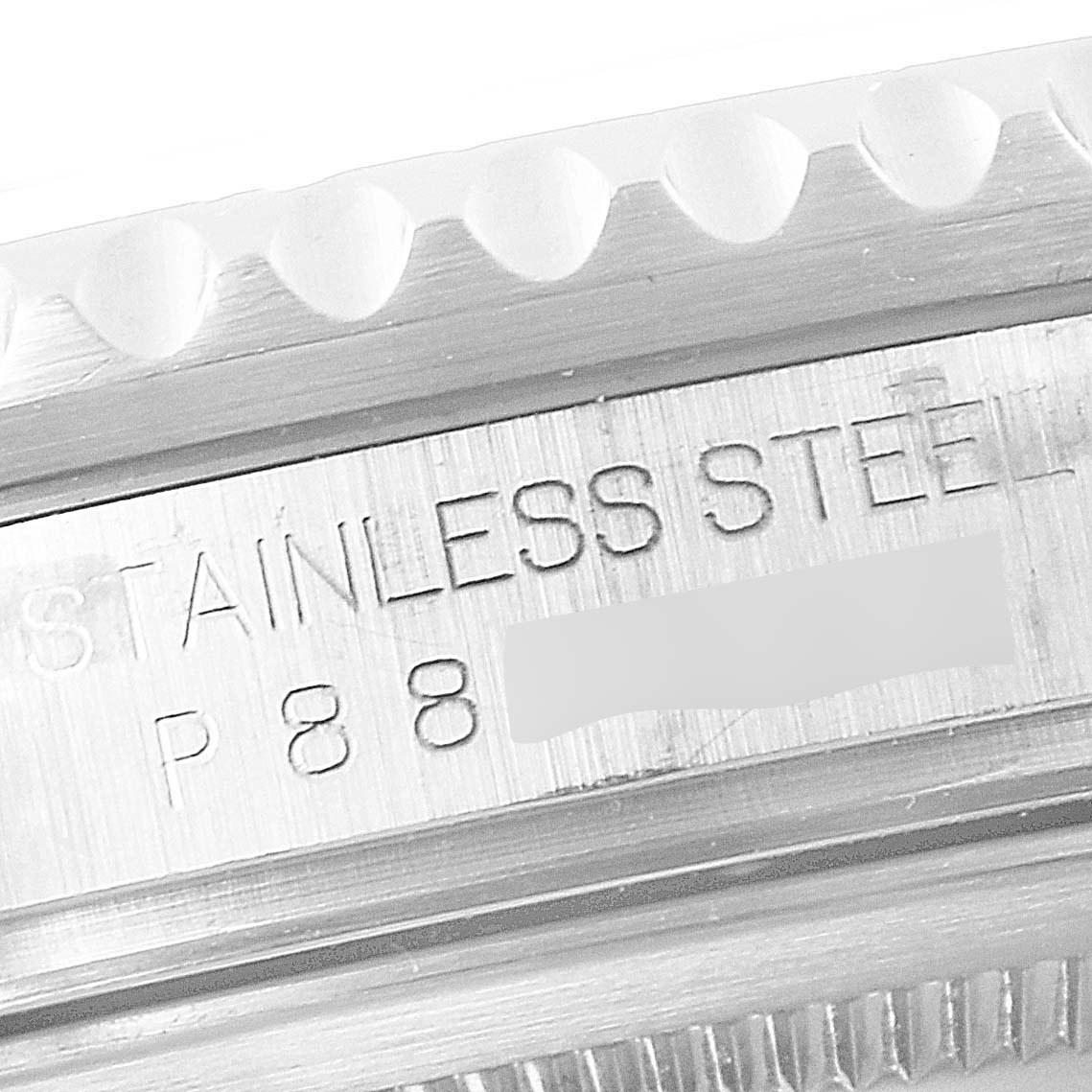 This image shows a close-up of the side of the stainless steel case and bezel of a Rolex GMT-Master 16710 Men
s Stainless Steel Black Dial 16710 Men
s Stainless Steel Black Dial watch.