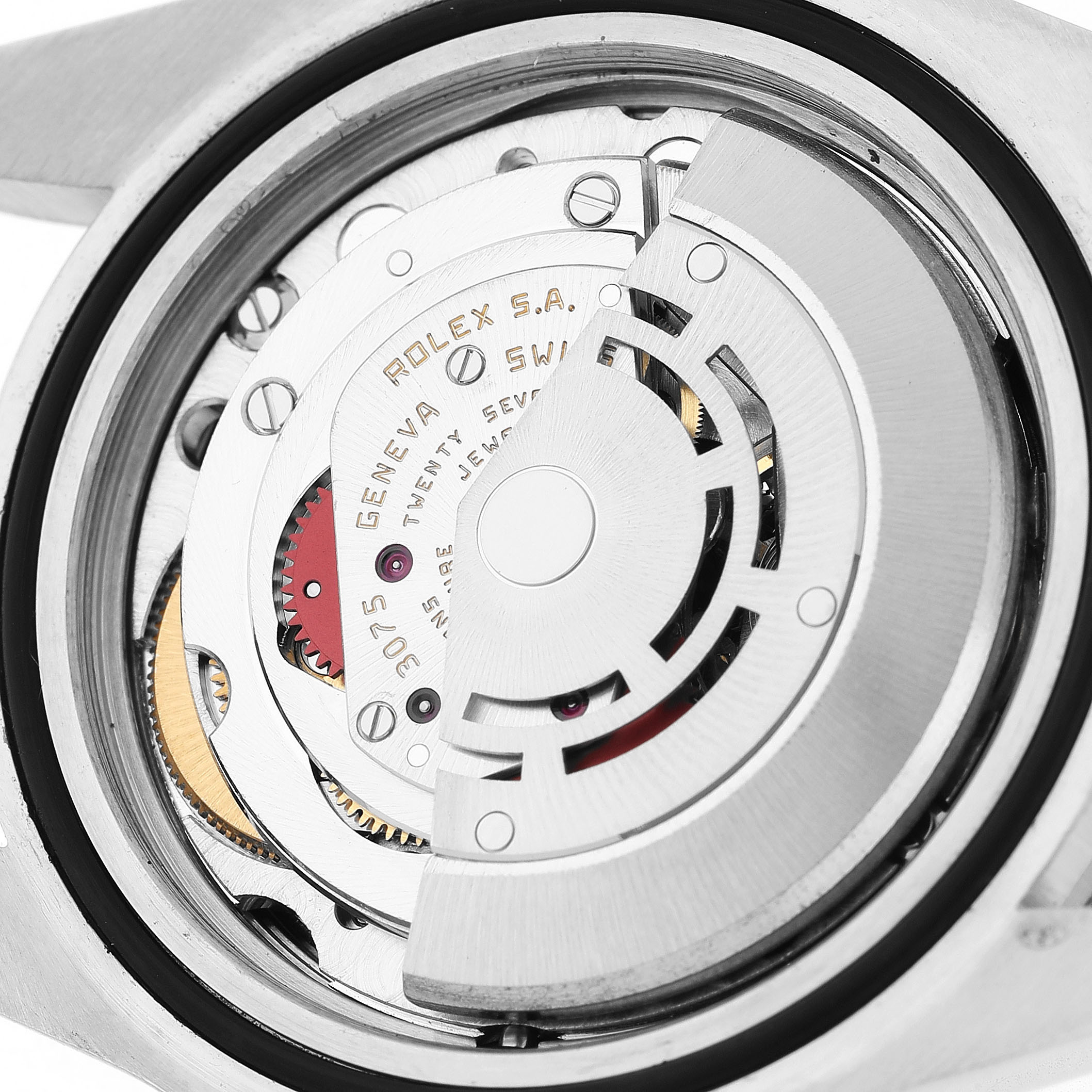 The image shows the back view of a Rolex GMT-Master 16750 Men's Stainless Steel Black Dial, focusing on its exposed automatic movement with engraved details.