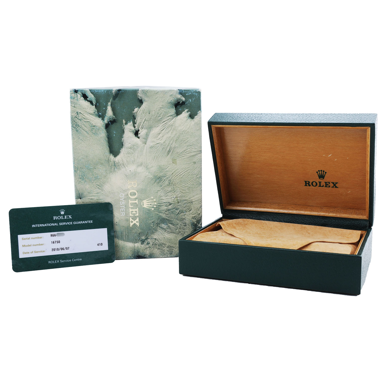The image shows Rolex GMT-Master 16750 Men's Stainless Steel Black Dial packaging with an open watch box, a protective cover, and an international service card.