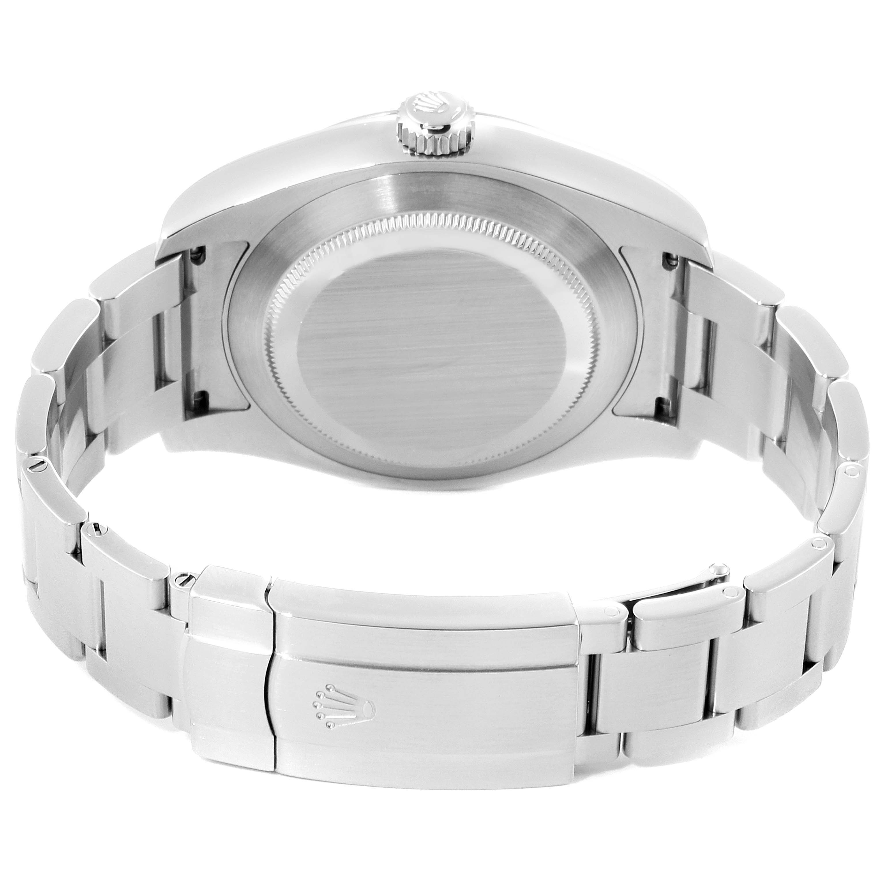 This image shows a rear view of the Rolex Air-King 116900 Men's Stainless Steel Black Dial 116900 Men's Stainless Steel Black Dial watch, highlighting its case back, crown, and clasp.