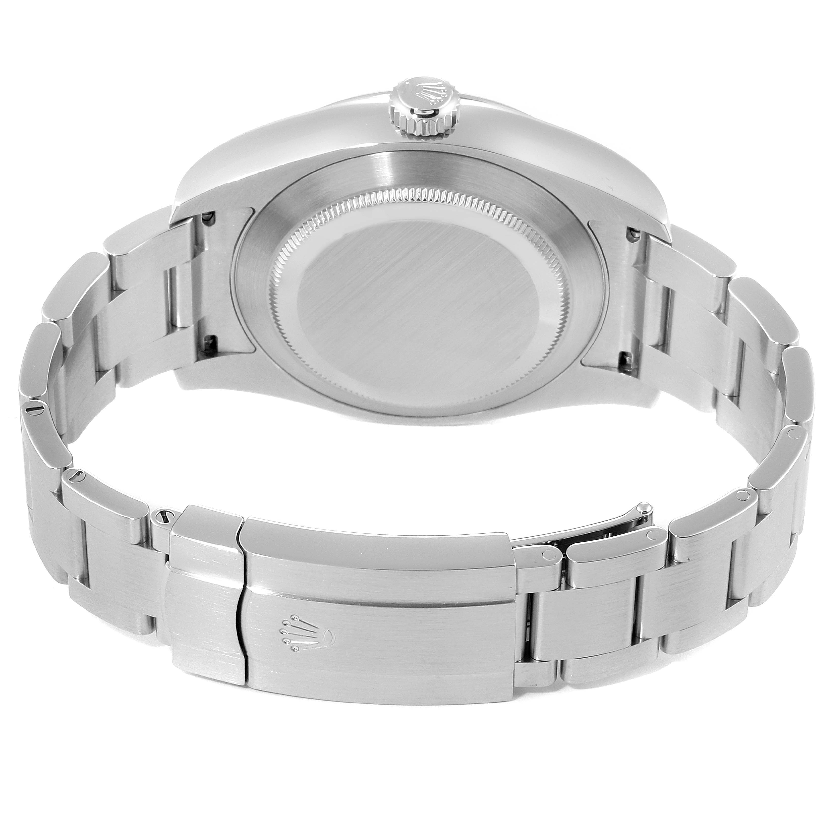 This image shows the back case, crown, and bracelet clasp of a Rolex Air-King 116900 Men's Stainless Steel Black Dial 116900 Men's Stainless Steel Black Dial watch.