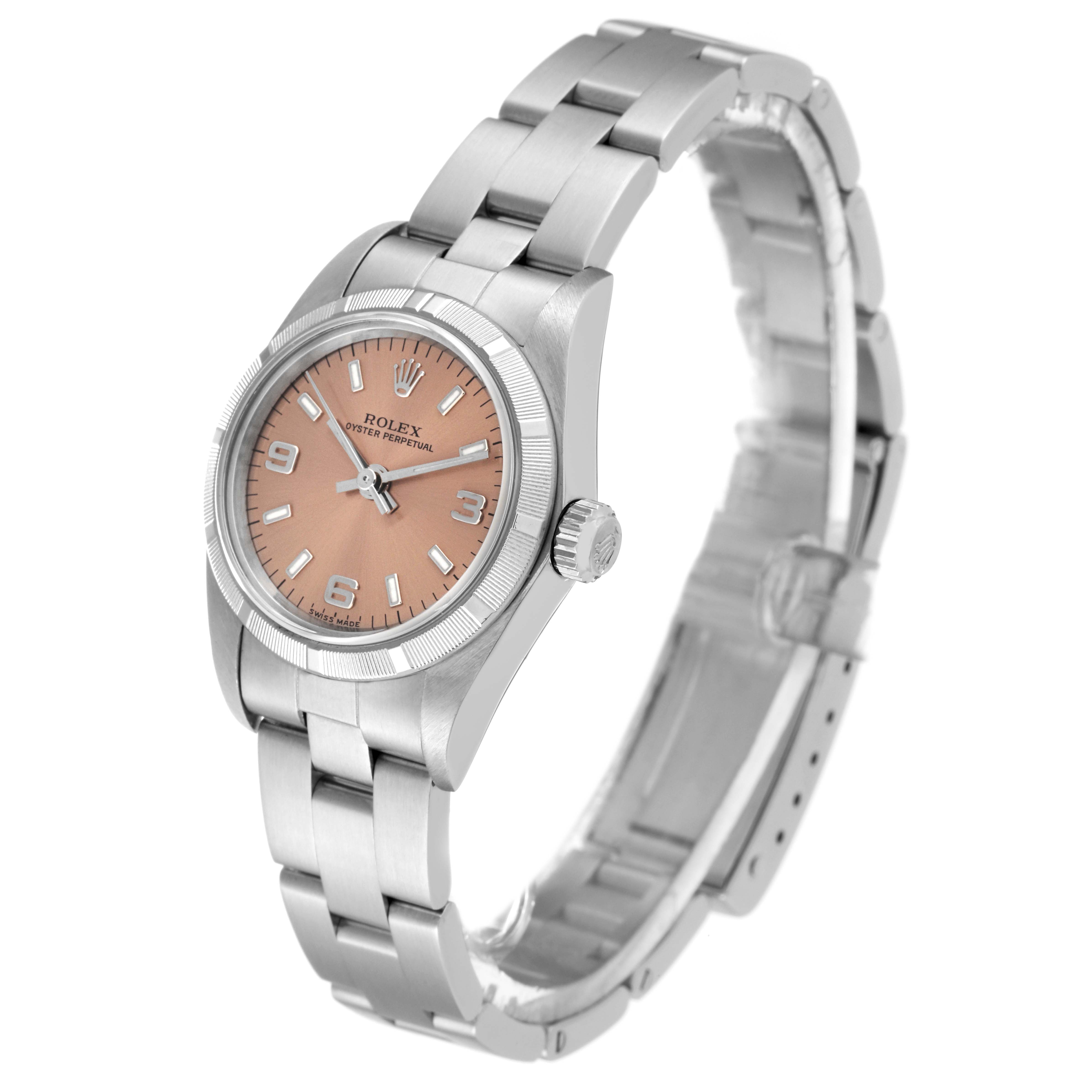 The Rolex Oyster Perpetual 76030 Women
s Stainless Steel Pink Dial 76030 Women
s Stainless Steel Pink Dial watch is shown at a slight angle, displaying the dial, bezel, crown, and bracelet.