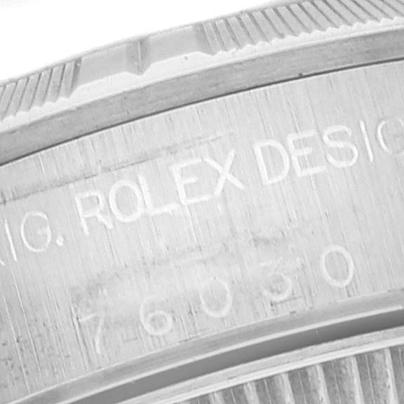This image shows an engraved section of the case back for the Rolex Oyster Perpetual 76030 Women
s Stainless Steel Pink Dial 76030 Women
s Stainless Steel Pink Dial watch.