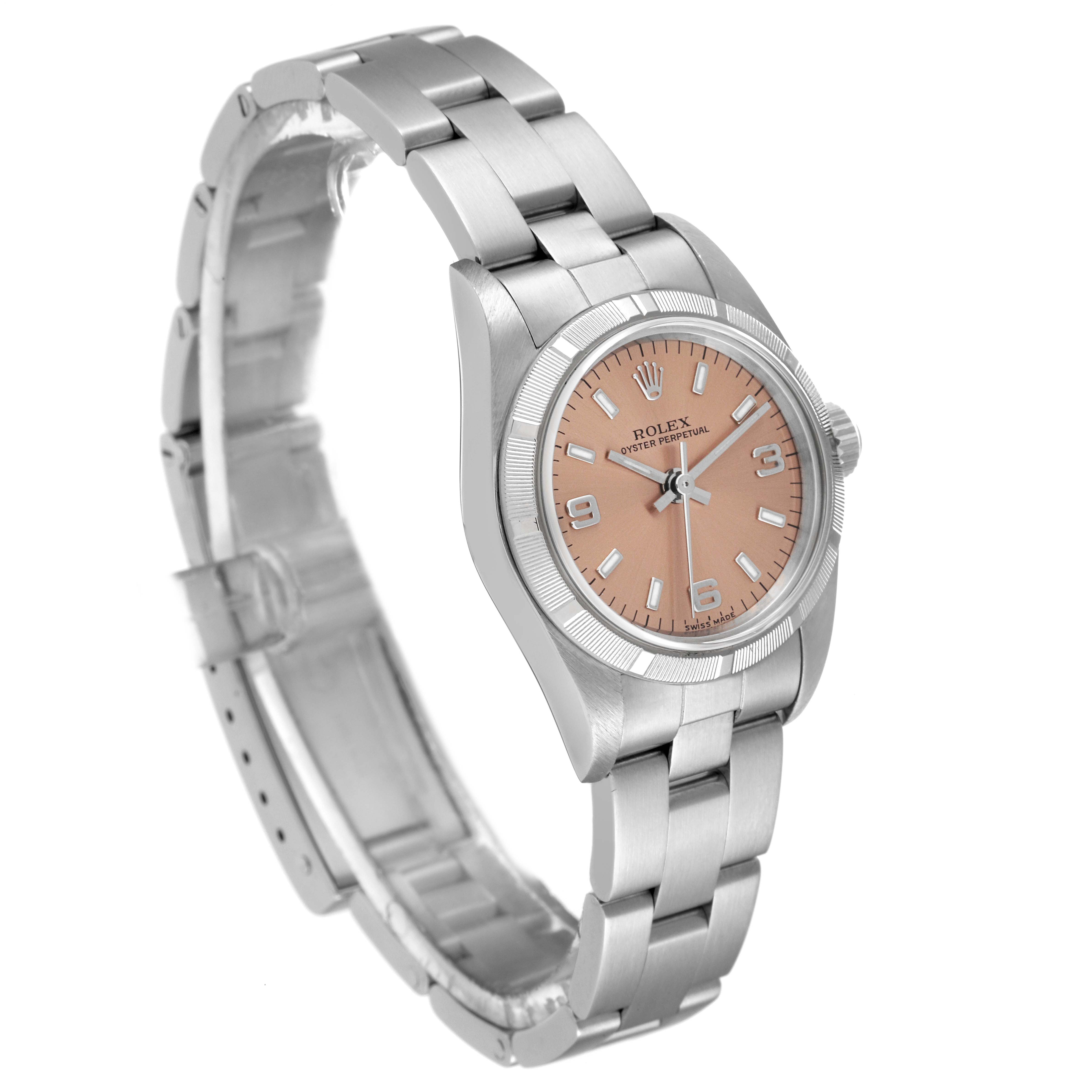 The image shows a Rolex Oyster Perpetual 76030 Women
s Stainless Steel Pink Dial 76030 Women
s Stainless Steel Pink Dial watch at an angled side view, highlighting its bracelet, case, and dial.