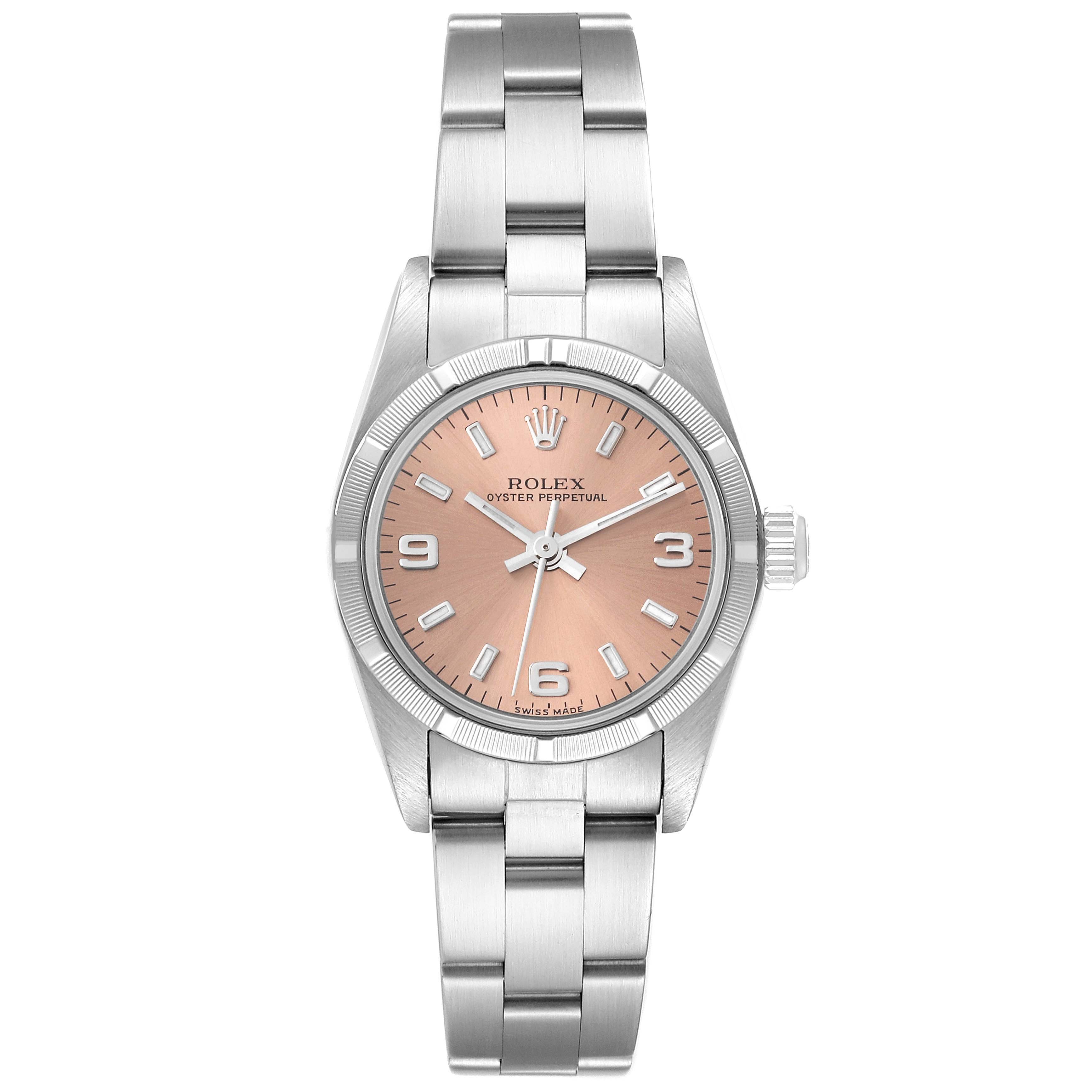 The Rolex Oyster Perpetual 76030 Women
s Stainless Steel Pink Dial 76030 Women
s Stainless Steel Pink Dial watch is shown from a top-down angle, displaying the dial, bracelet, and case.