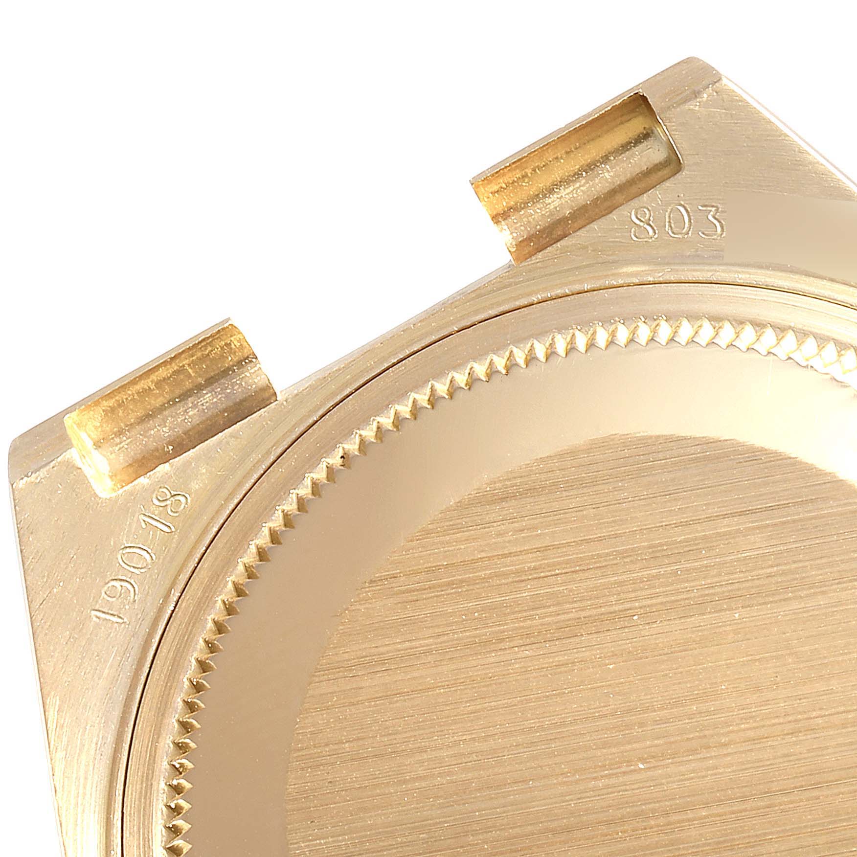 This image shows a close-up of the lugs and case back of a Rolex Oysterquartz 19018 Men's Yellow Gold Champagne Dial 19018 Men's Yellow Gold Champagne Dial watch.