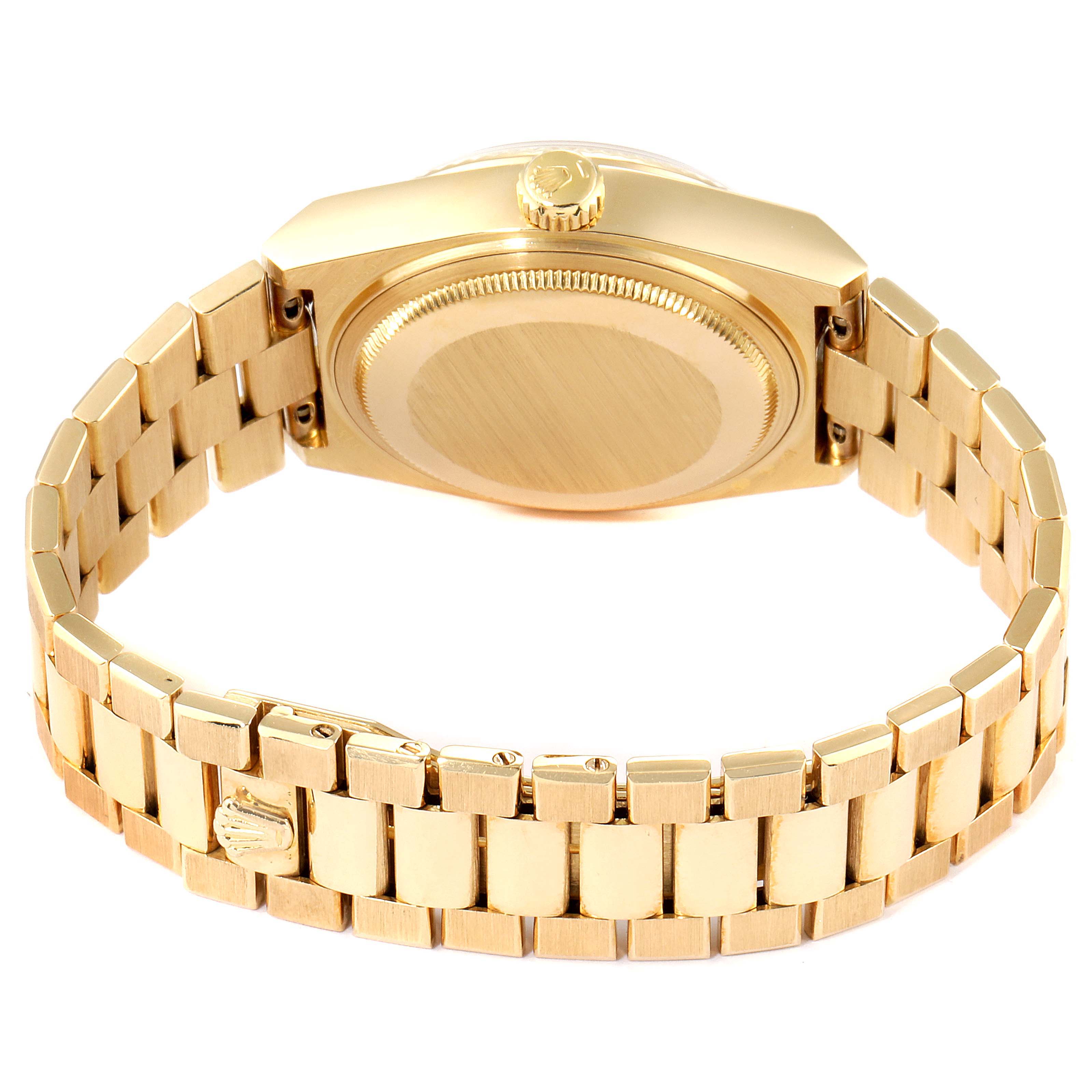 The image shows the back and side view of the Rolex Oysterquartz 19018 Men's Yellow Gold Champagne Dial 19018 Men's Yellow Gold Champagne Dial watch, highlighting its gold bracelet and case.