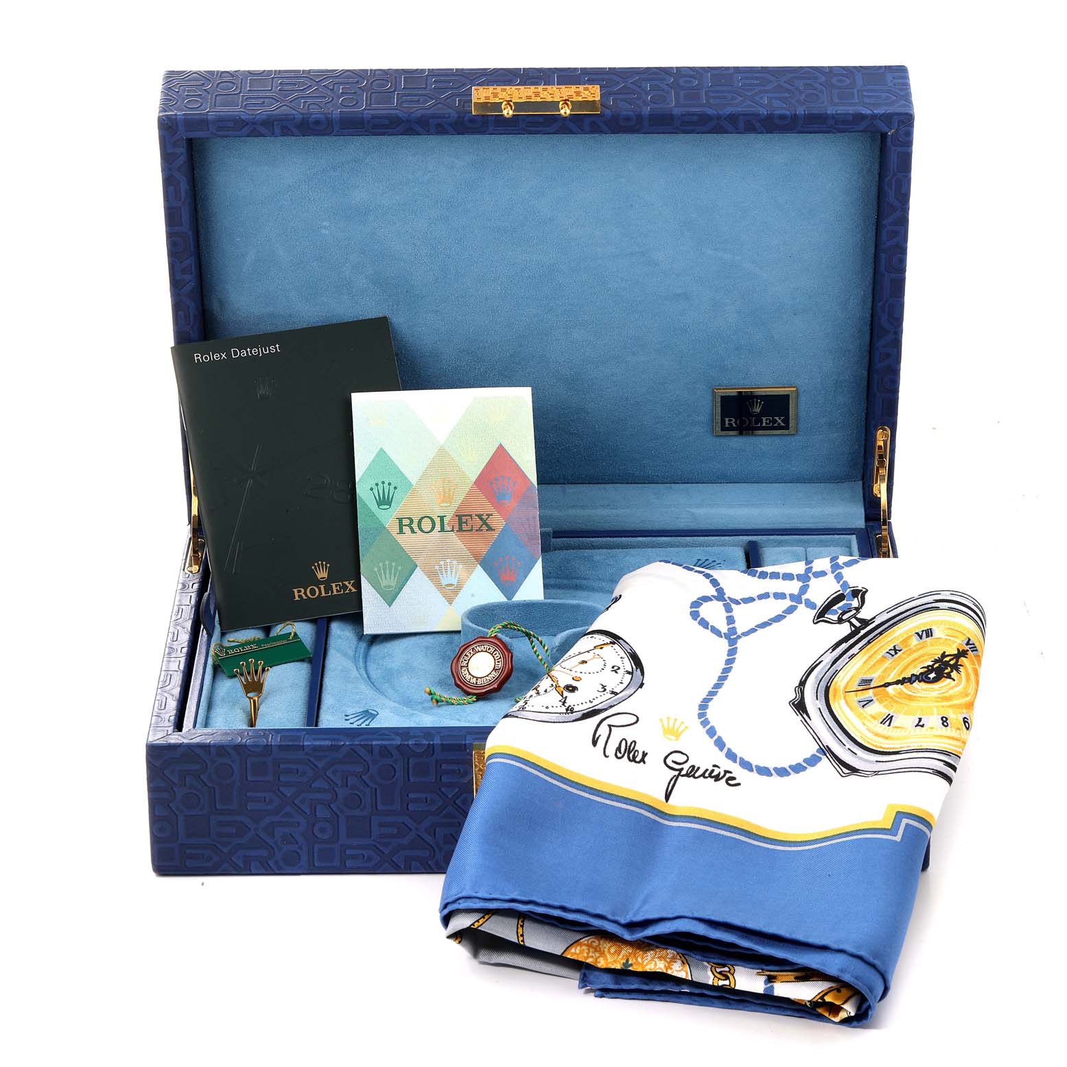 The image shows a Rolex Pearlmaster 80298 Women's Yellow Gold Mother of Pearl Dial 80298 Women's Yellow Gold Mother of Pearl Dial watch with its accessories, from a top angle, in an open box with documents and a cloth.