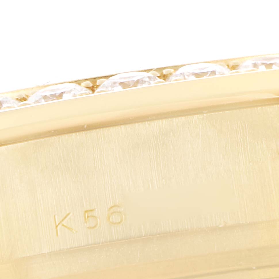 This close-up image shows the side view of the bezel and part of the bracelet of the Rolex Pearlmaster 80298 Women's Yellow Gold Mother of Pearl Dial 80298 Women's Yellow Gold Mother of Pearl Dial watch, featuring diamonds.
