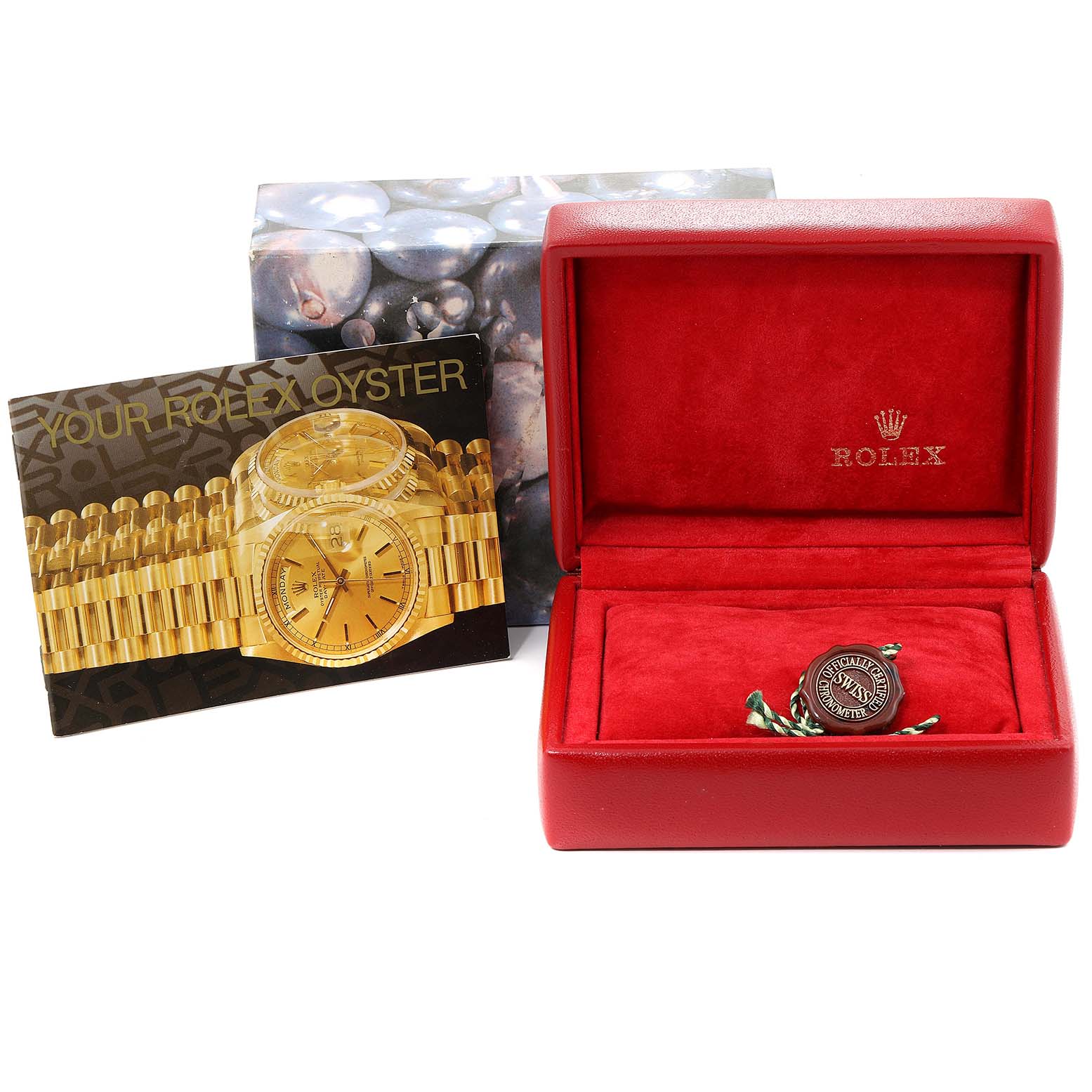 The image shows the packaging, booklet, and tag for a Rolex President 69178 Women
s Yellow Gold Champagne Dial 69178 Women
s Yellow Gold Champagne Dial model watch without the actual watch.