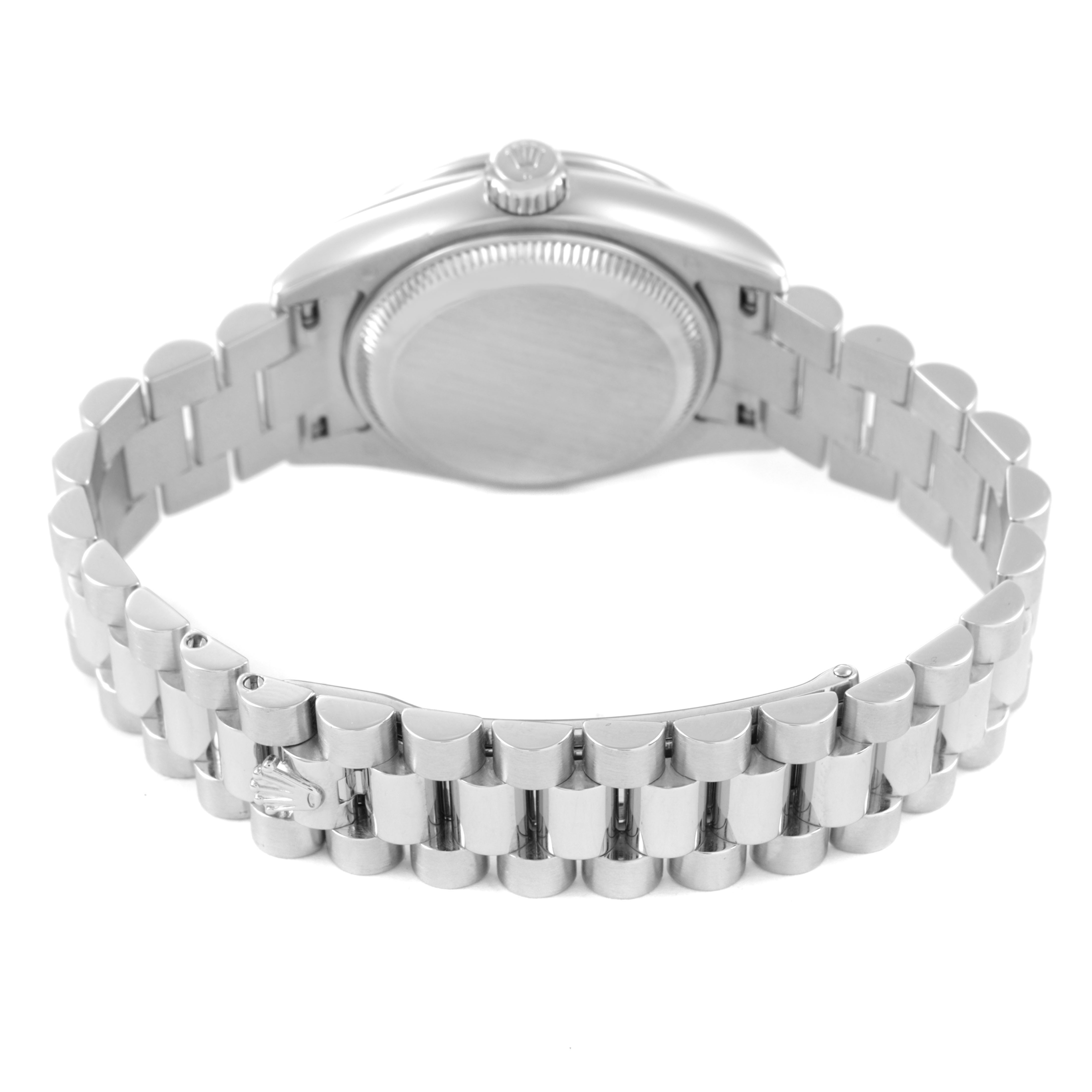 The image shows the back and bracelet of a Rolex President 179136 Women's Platinum Blue Dial model watch, highlighting its clasp and case from a rear angle.