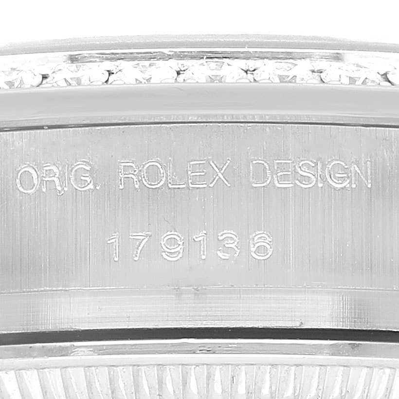 The image shows a close-up of the side of a Rolex President 179136 Women's Platinum Blue Dial model, featuring the engraved model number.