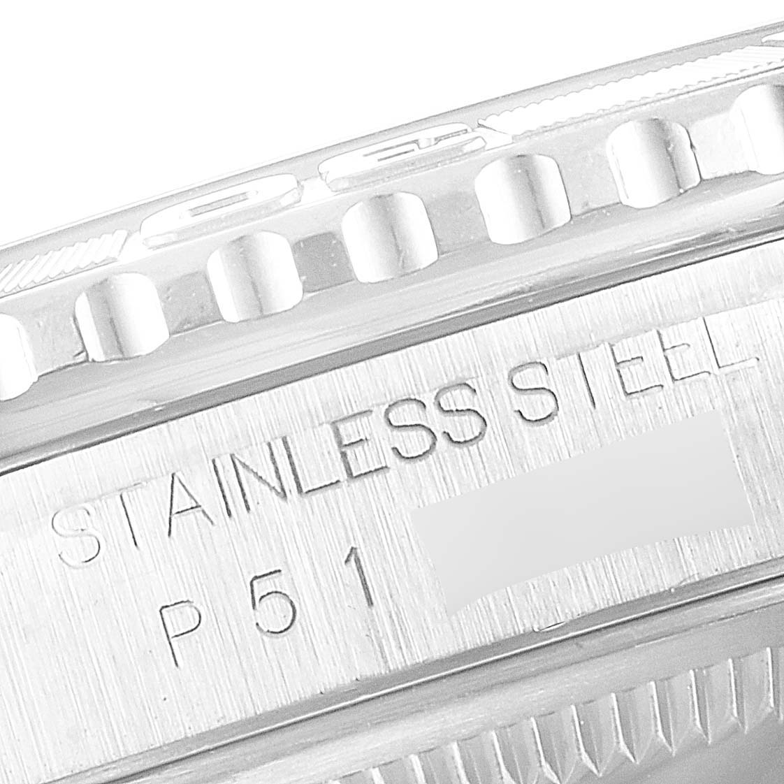 This close-up image of a Rolex Turn-o-Graph 16264 Men's Stainless Steel White Dial 16264 Men's Stainless Steel White Dial watch shows the bezel and engraved text on the stainless steel case.