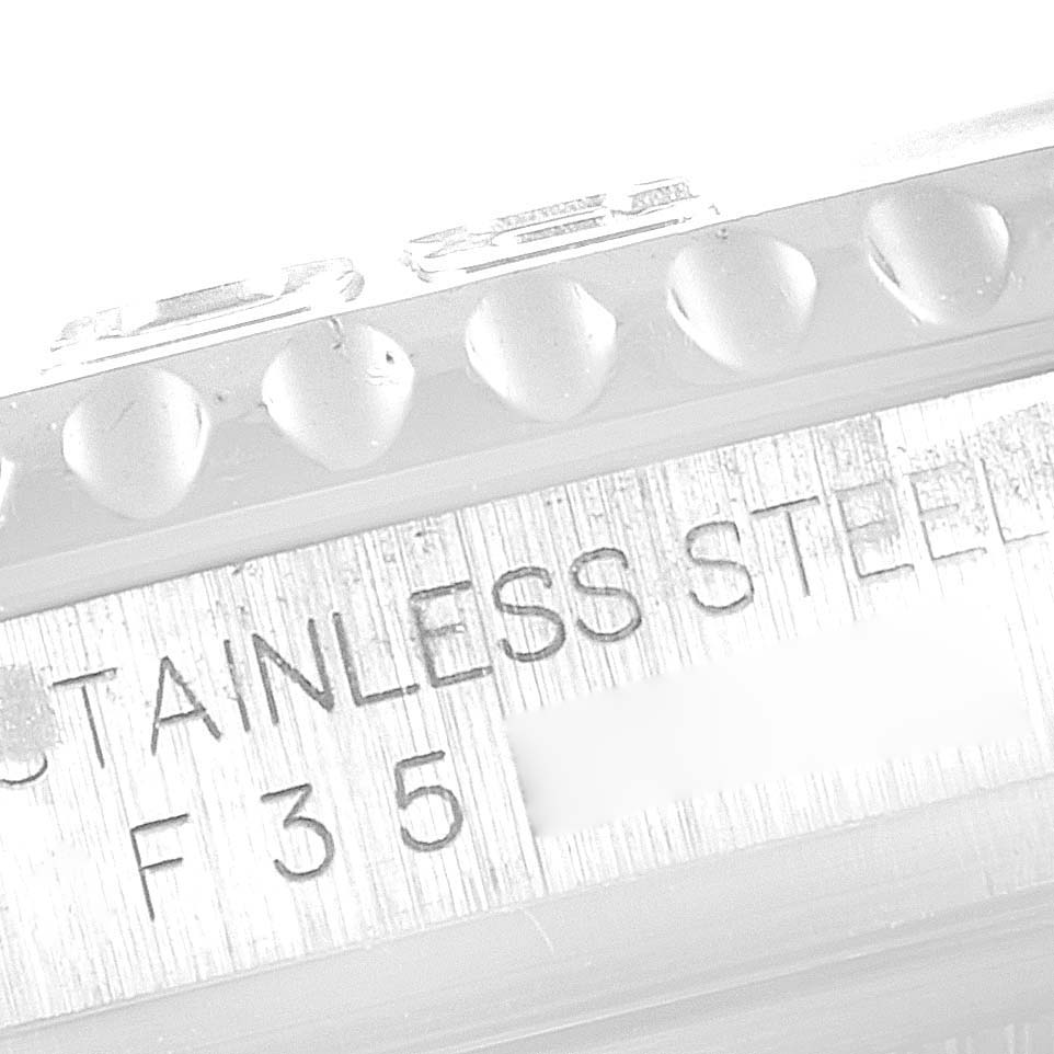 The image shows an angled close-up of the side of a Rolex Yacht-Master 16622 Men's Stainless Steel Silver Dial 16622 Men's Stainless Steel Silver Dial watch, highlighting the "STAINLESS STEEL" text on the case.
