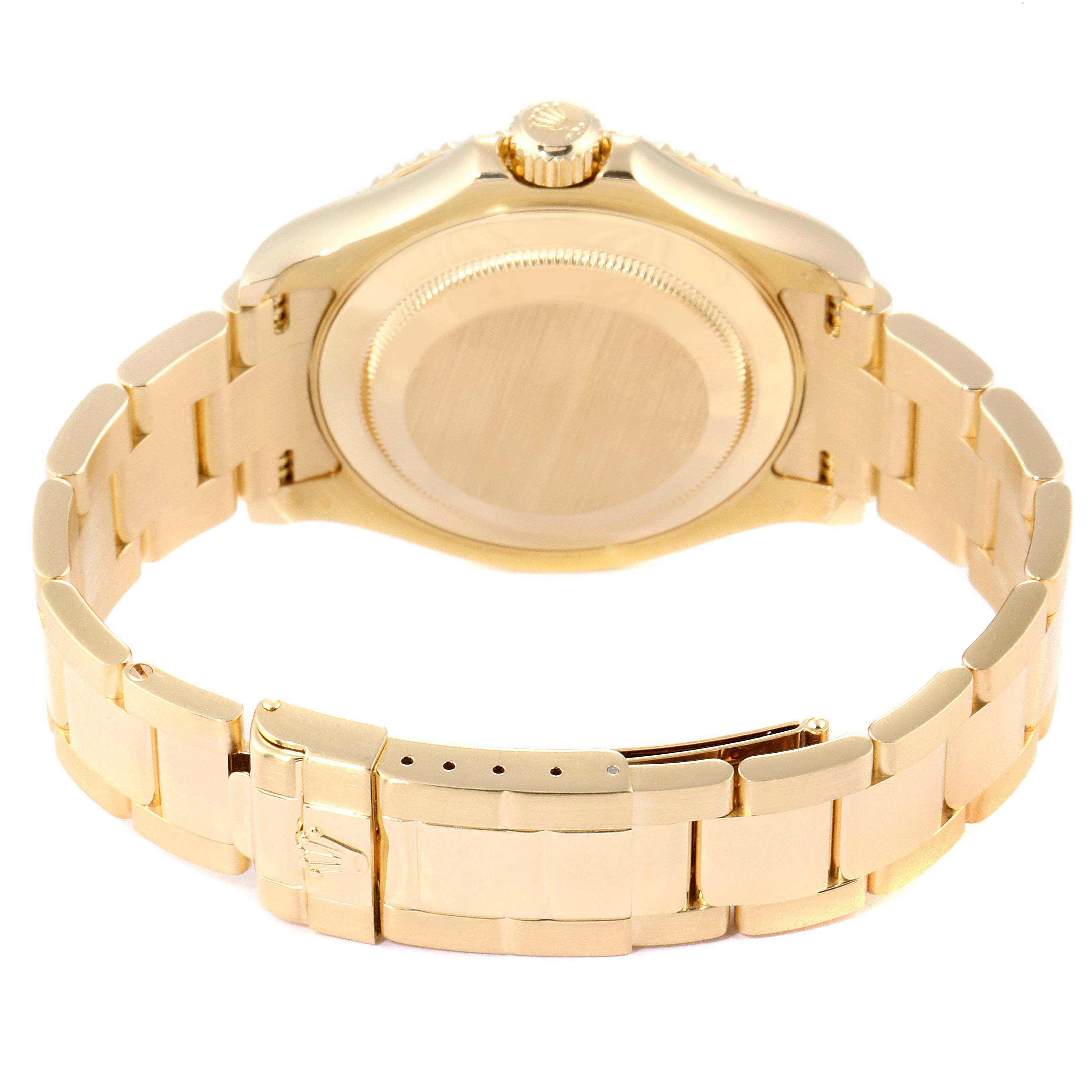 This image shows the back view of a Rolex Yacht-Master 16628B Men's Yellow Gold White Dial 16628B Men's Yellow Gold White Dial watch, featuring its case back and bracelet.