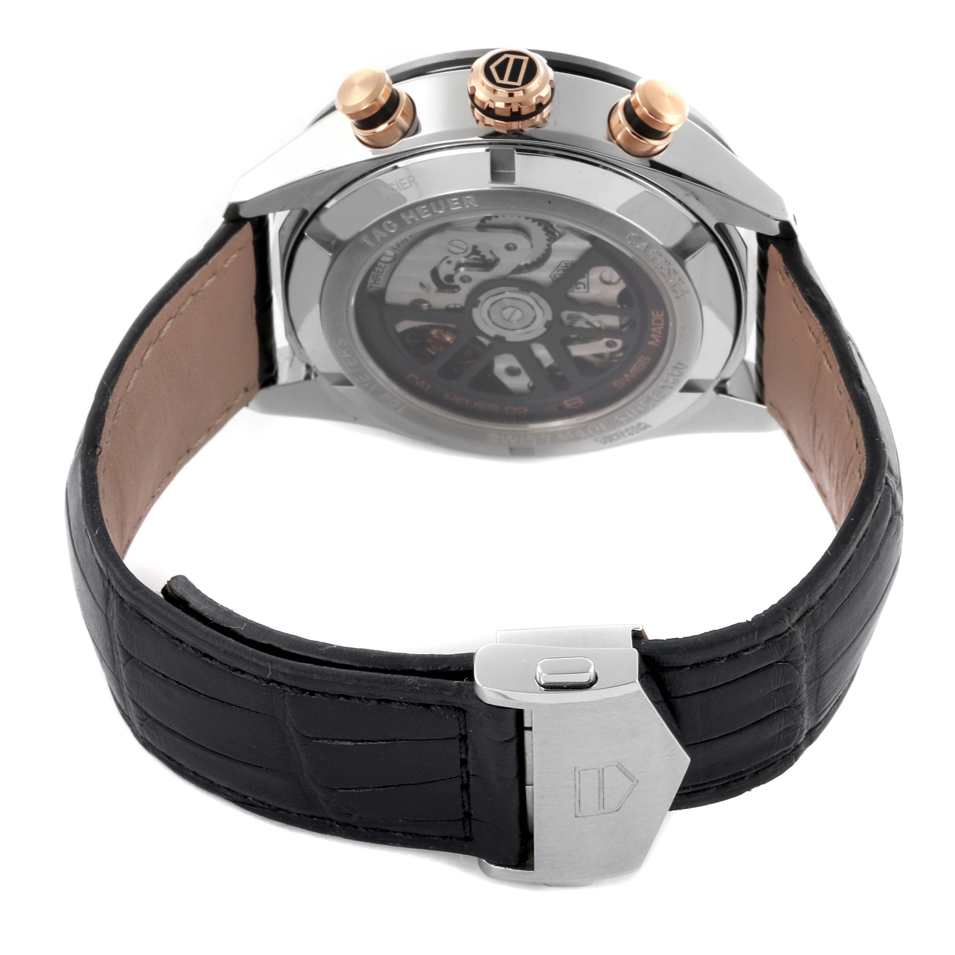 The Tag Heuer Carrera CBN2A5A.FC6481 Men's Stainless Steel Black Dial CBN2A5A.FC6481 Men's Stainless Steel Black Dial watch is shown from the back, displaying its transparent case back, strap, and buckles.