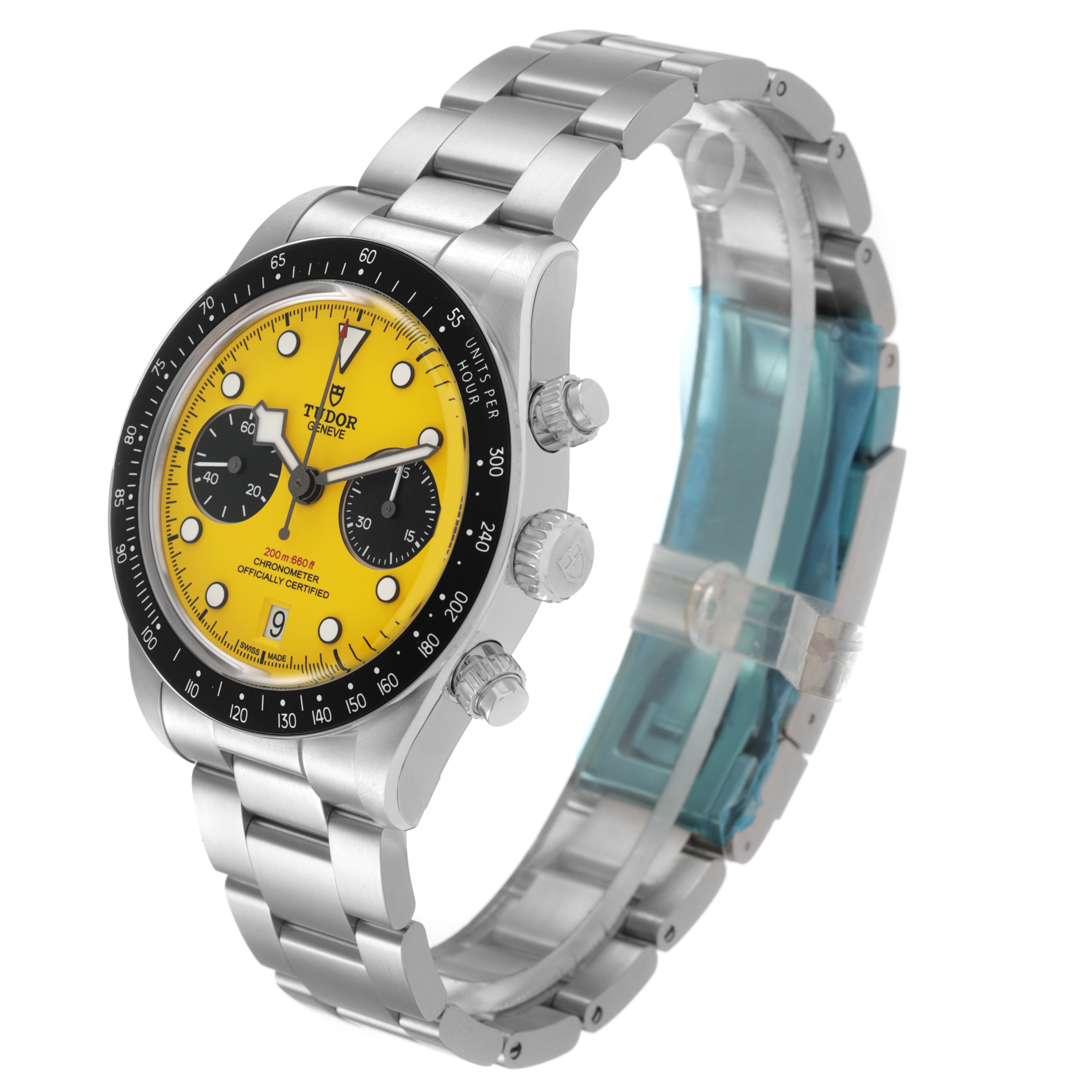 The Tudor Heritage Black Bay M79310N-0001 Men's Stainless Steel Yellow Dial watch is shown at a three-quarter angle, displaying the watch face, bezel, crown, and part of the bracelet.