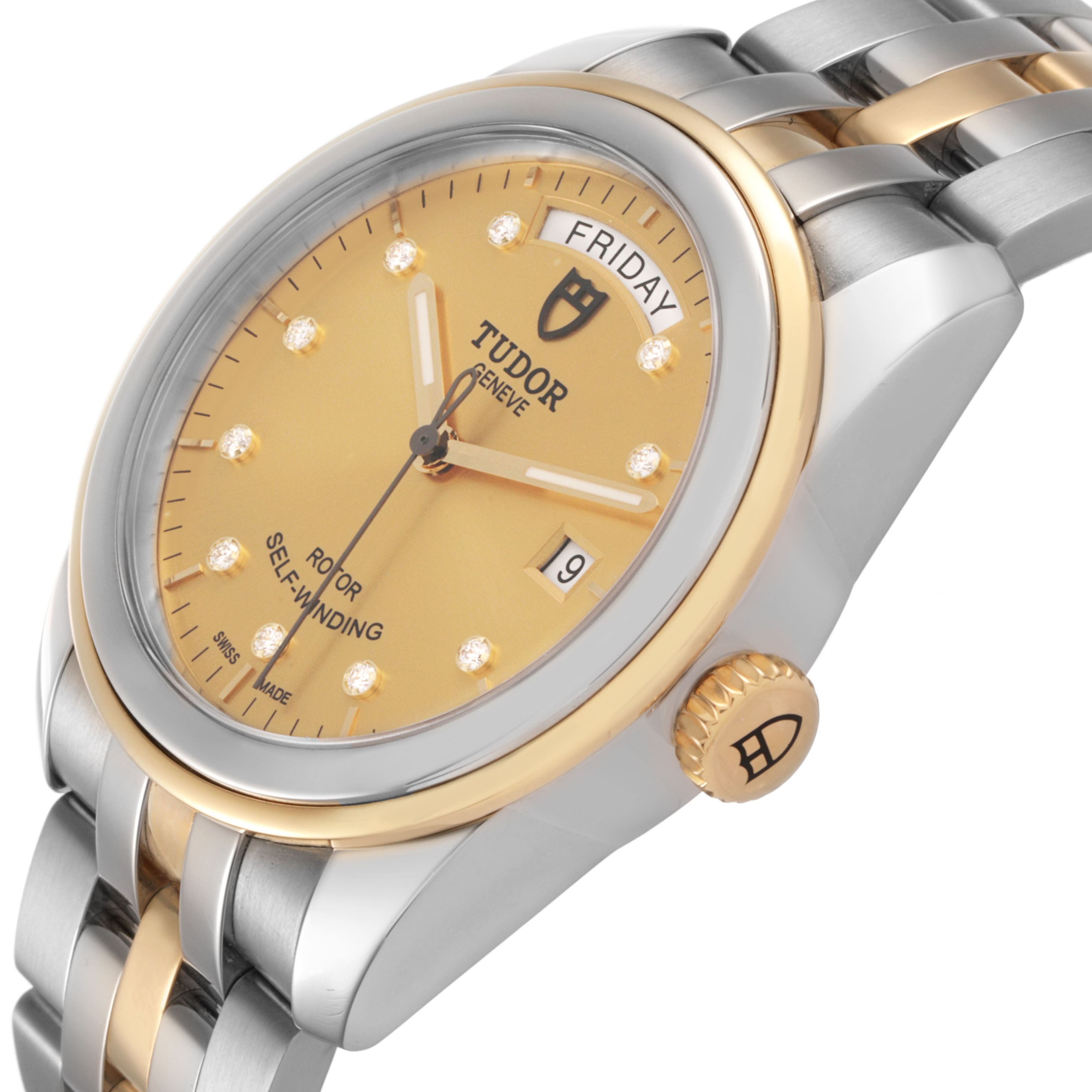 The Tudor Glamour 56003 Men's Steel and Gold (two tone) Champagne Dial watch is shown at an angle highlighting its gold dial, date, day feature, crown, and two-tone bracelet.
