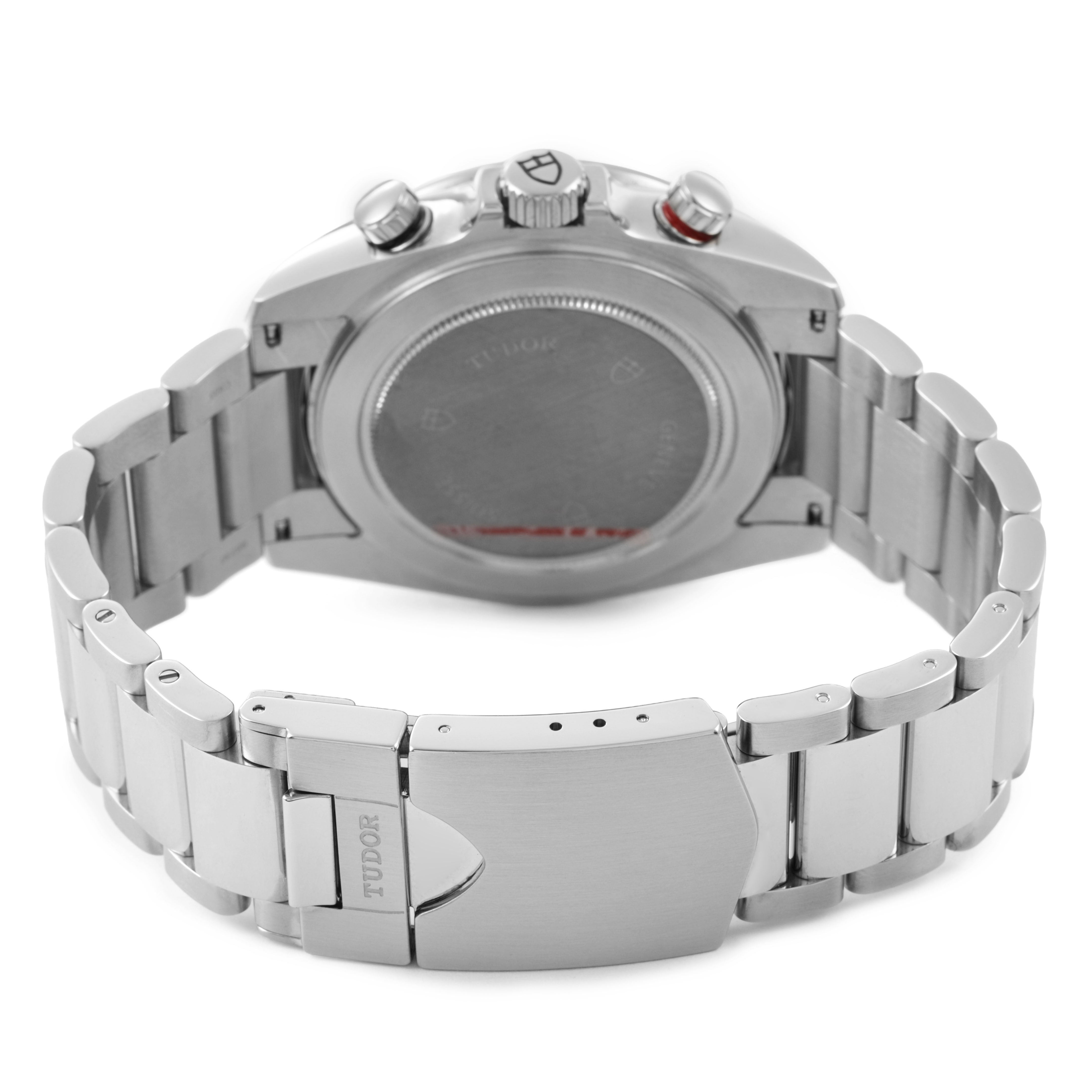 The Tudor Glamour 20550N-95730 Men's Stainless Steel White Dial watch is shown from the back, highlighting the case back, bracelet, and clasp.