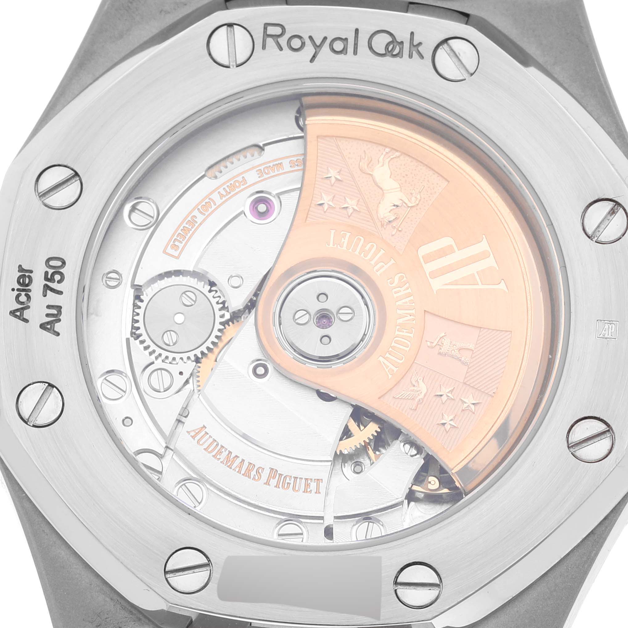 This image shows the back view of an Audemars Piguet Royal Oak 15450SR.OO.1256SR.01 Men's Steel and Gold (two tone) Silver Dial 15450SR.OO.1256SR.01 Men's Steel and Gold (two tone) Silver Dial watch, highlighting its inner mechanics and rotor.