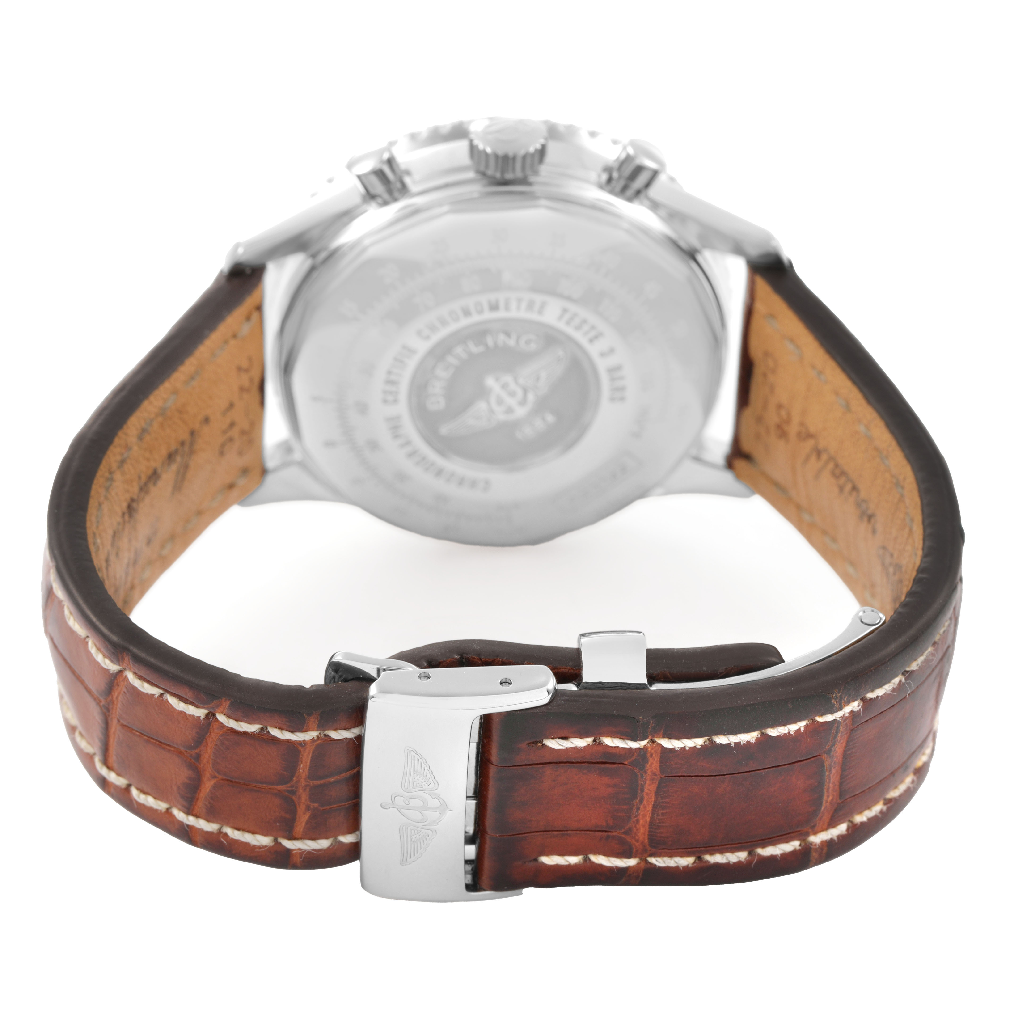 The image shows the back view of a Breitling Navitimer A23322 Men's Stainless Steel Silver Dial watch, featuring the case back and brown leather strap with a clasp.