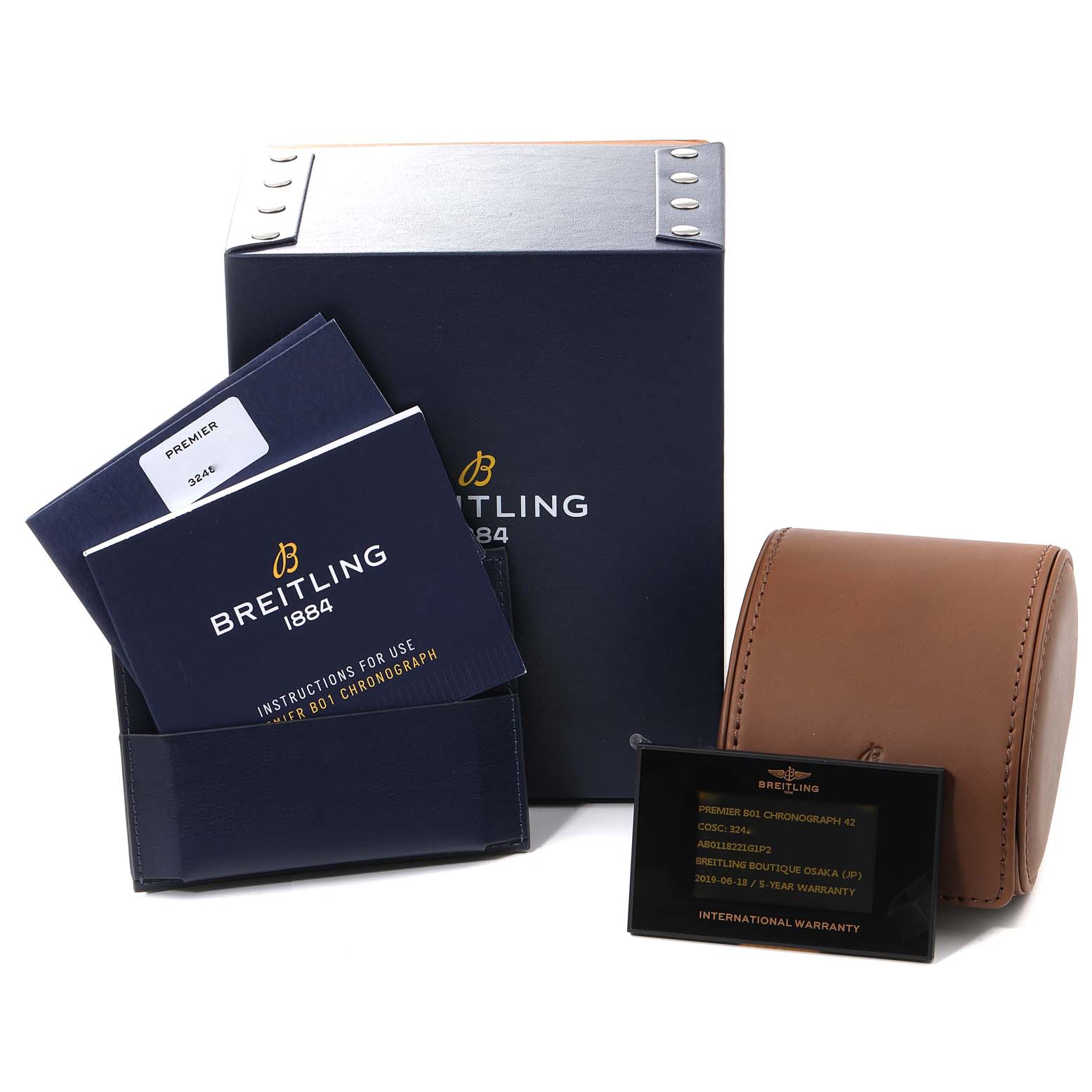 The image shows the packaging, manuals, warranty card, and a leather case for the Breitling Premier AB011822/G843-1018PT Men's Stainless Steel Silver Dial AB011822/G843-1018PT Men's Stainless Steel Silver Dial model watch.