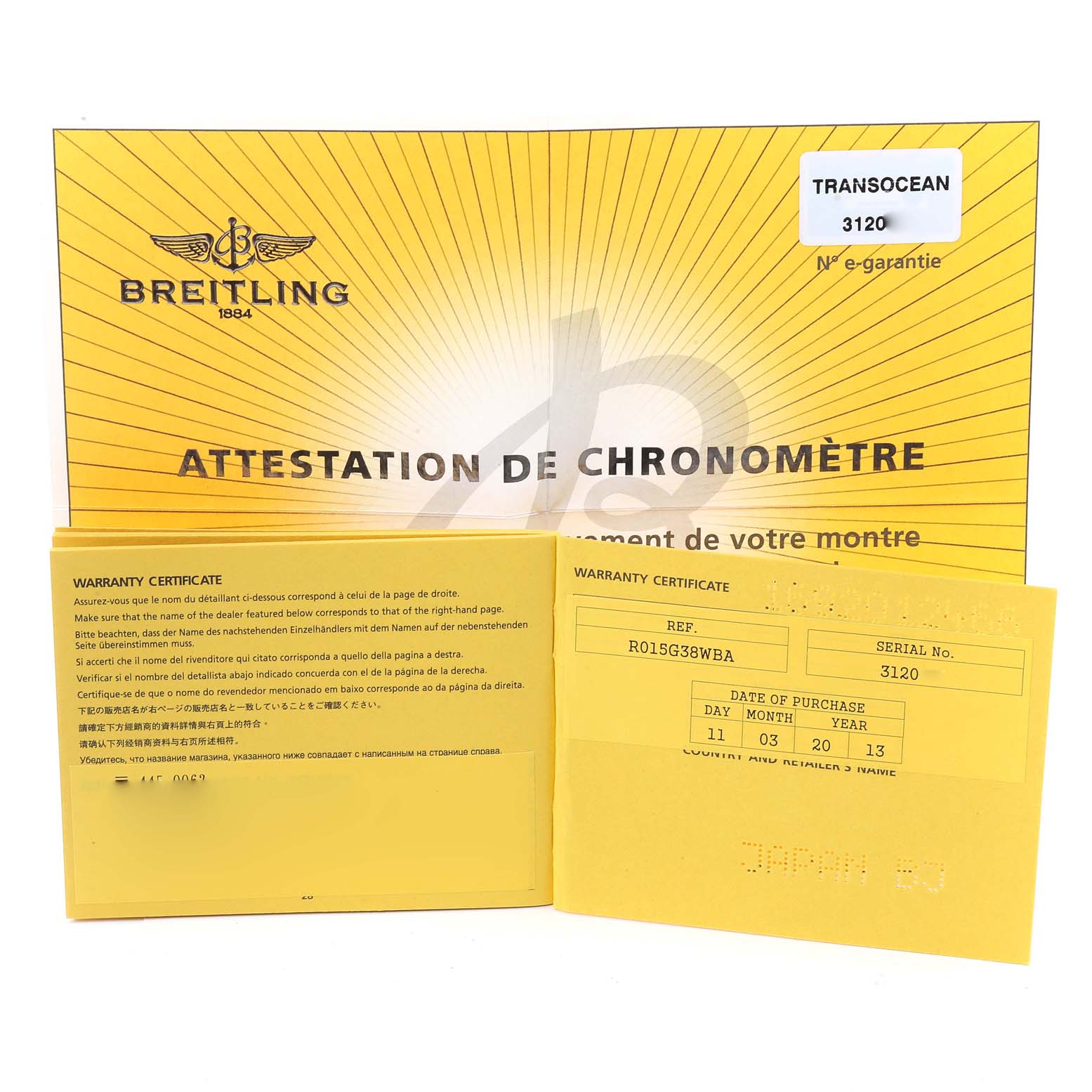 The image shows opened warranty certificates and a chronometer attestation for a Breitling Transocean RB0152 Men's Rose Gold Silver Dial RB0152 Men's Rose Gold Silver Dial model.