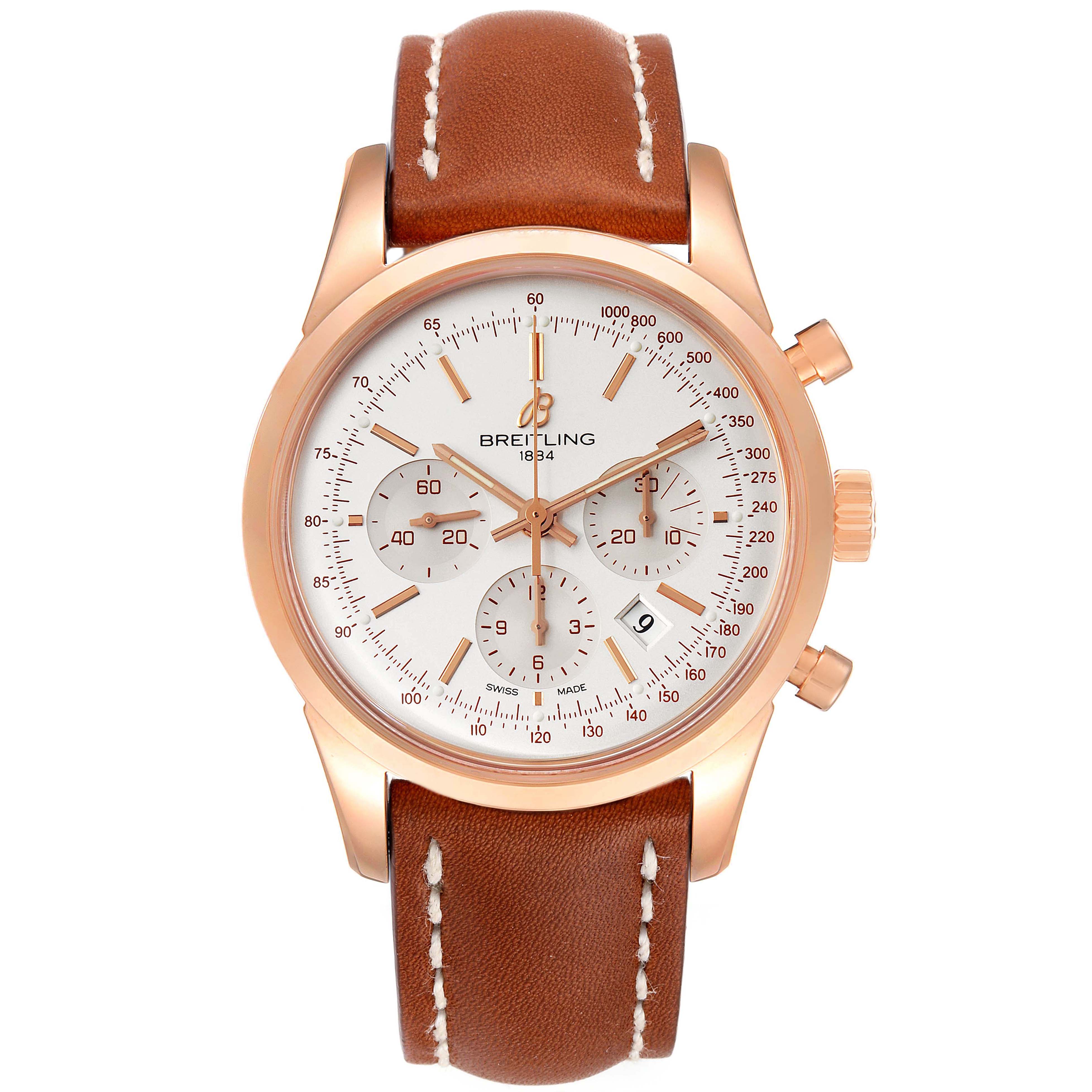 The image shows a Breitling Transocean RB0152 Men's Rose Gold Silver Dial RB0152 Men's Rose Gold Silver Dial watch from a front angle, highlighting its dial, chronograph subdials, and leather strap.