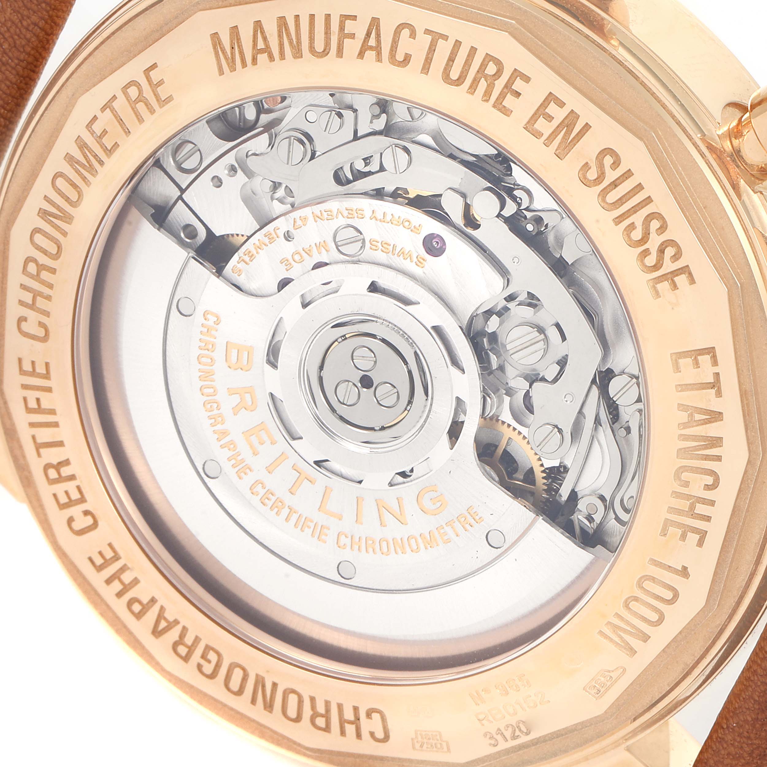 This image shows the back of a Breitling Transocean RB0152 Men's Rose Gold Silver Dial RB0152 Men's Rose Gold Silver Dial watch, highlighting its exposed mechanical movement and engraved case back.