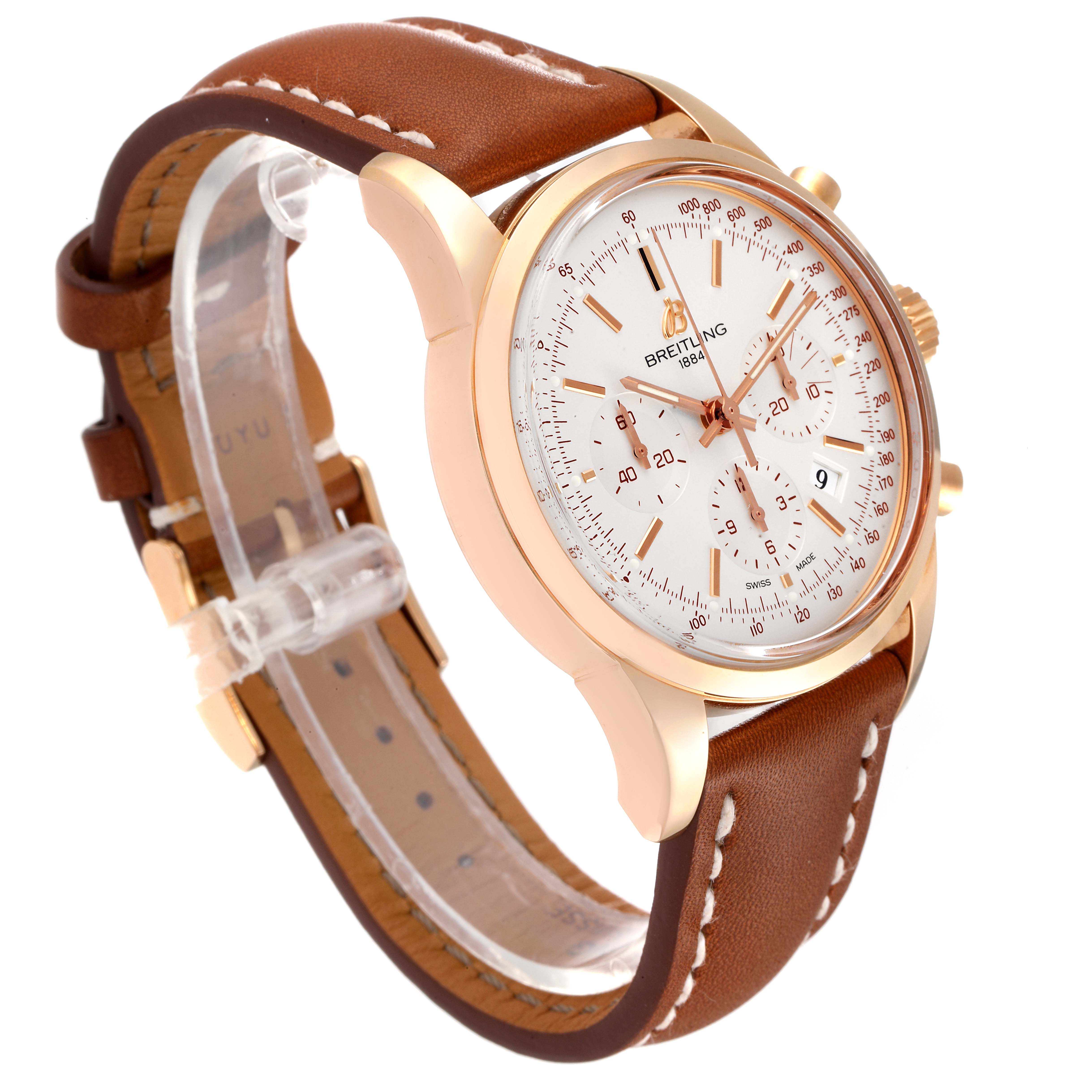 The Breitling Transocean RB0152 Men's Rose Gold Silver Dial RB0152 Men's Rose Gold Silver Dial model watch is shown at a slight angled view, displaying its dial, bezel, and brown leather strap.