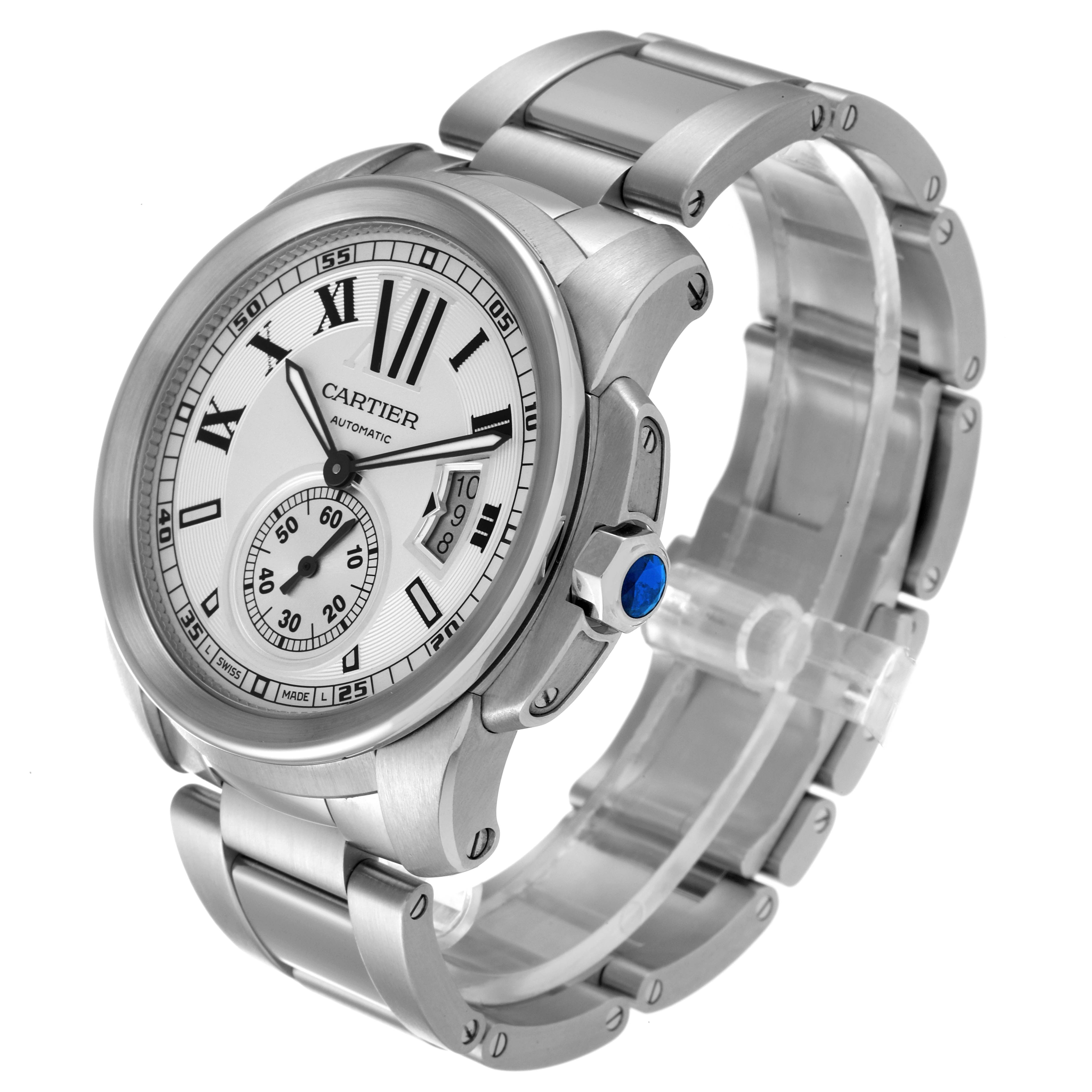 The image shows a Calibre de Cartier watch by Cartier from a 3/4 angle, highlighting the face, bezel, crown, and bracelet.