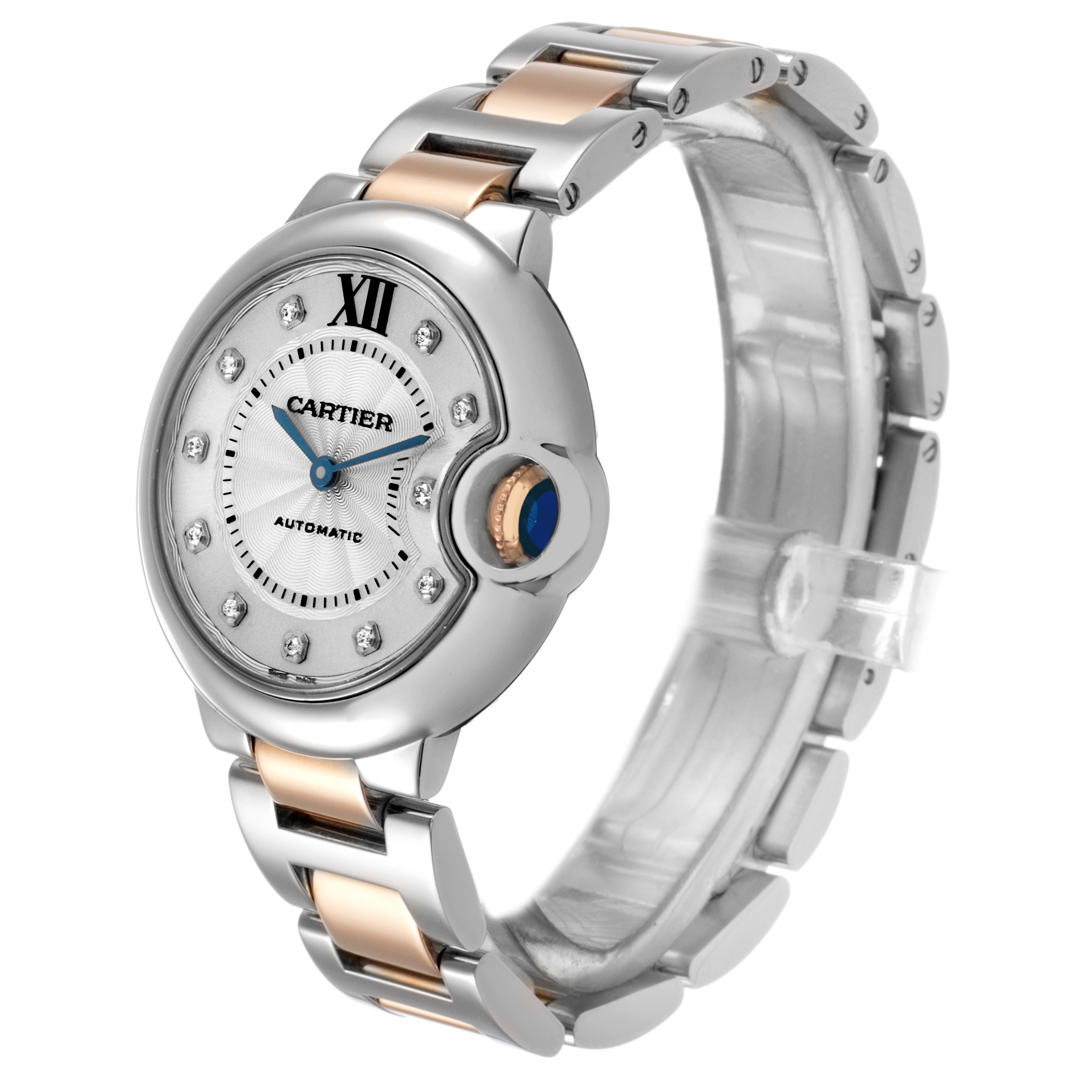 The Cartier Ballon Bleu WE902061 Women's Steel and Gold (two tone) Silver Dial watch is shown at a three-quarter angle, highlighting the face, bracelet, and crown details.