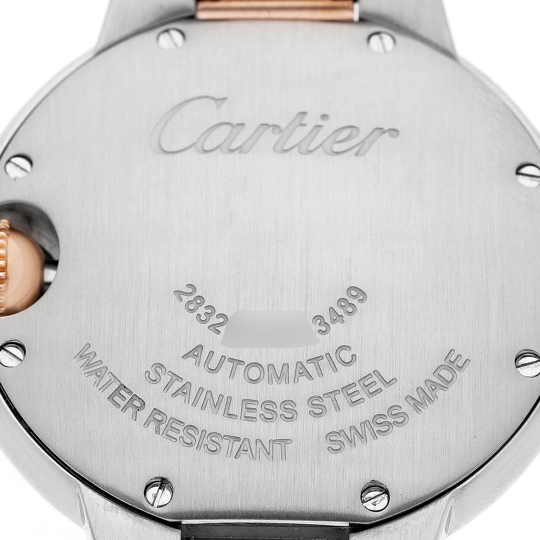 The image shows the back of a Cartier Ballon Bleu WE902061 Women's Steel and Gold (two tone) Silver Dial watch, highlighting its stainless steel and automatic features.