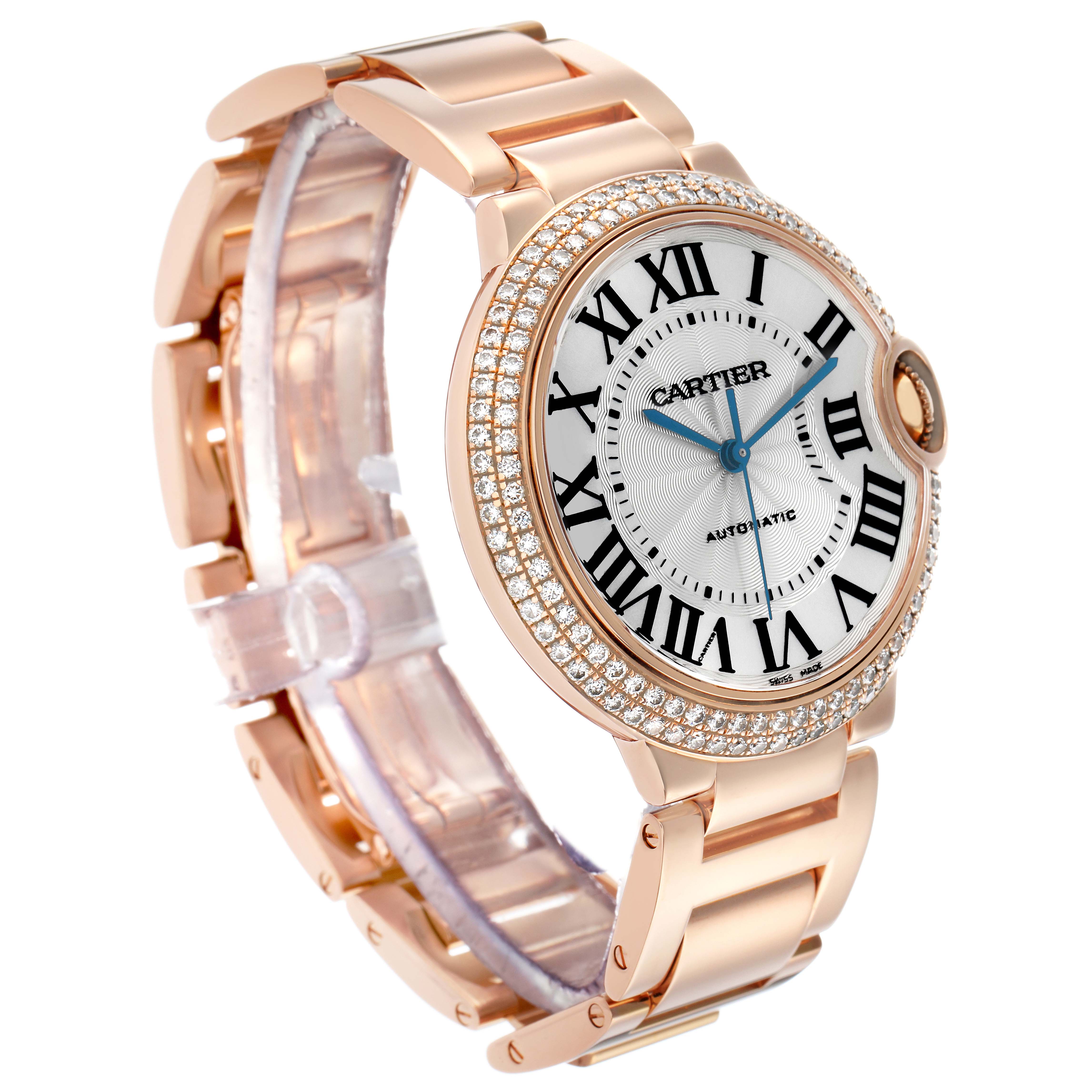 The Cartier Ballon Bleu WE9005Z3 Women's Rose Gold Silver Dial watch is shown at a three-quarter angle featuring a diamond-studded bezel and gold bracelet.
