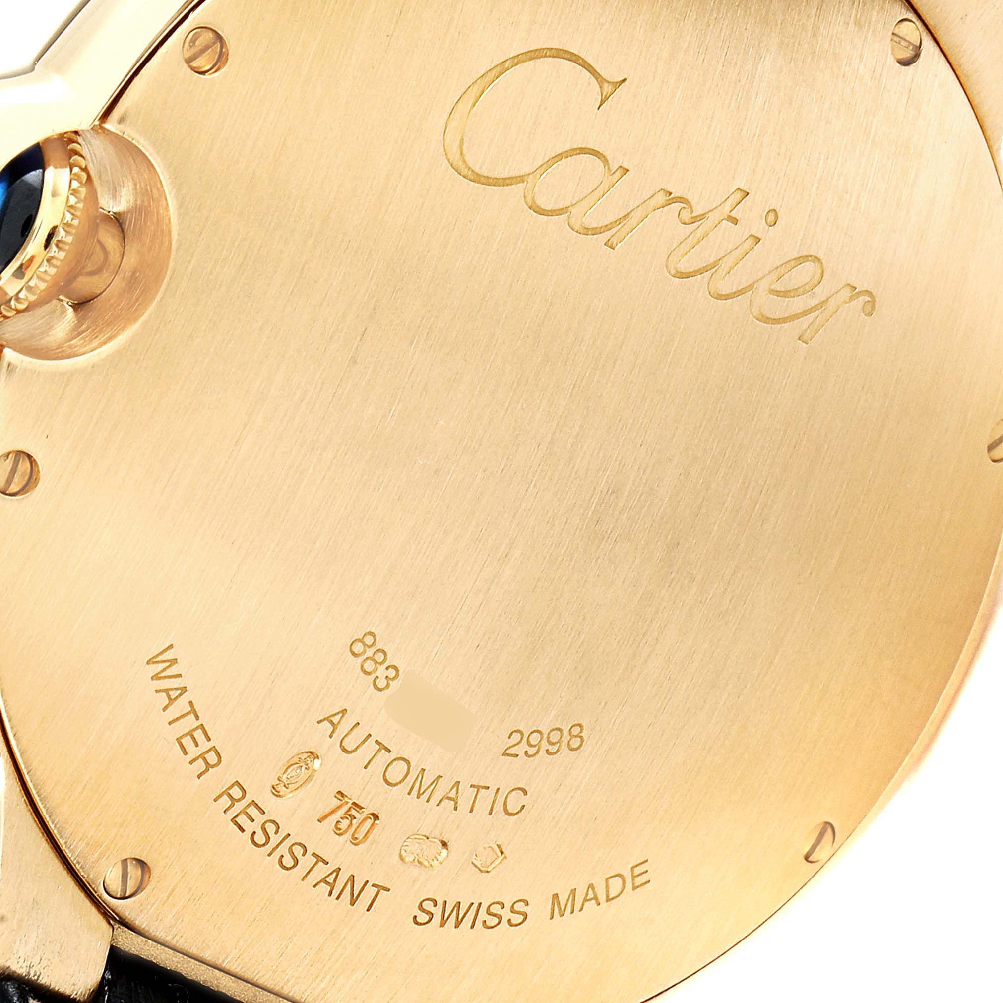 The image shows the case back and crown of a Cartier Ballon Bleu W6900551 Men's Yellow Gold Silver Dial W6900551 Men's Yellow Gold Silver Dial watch.