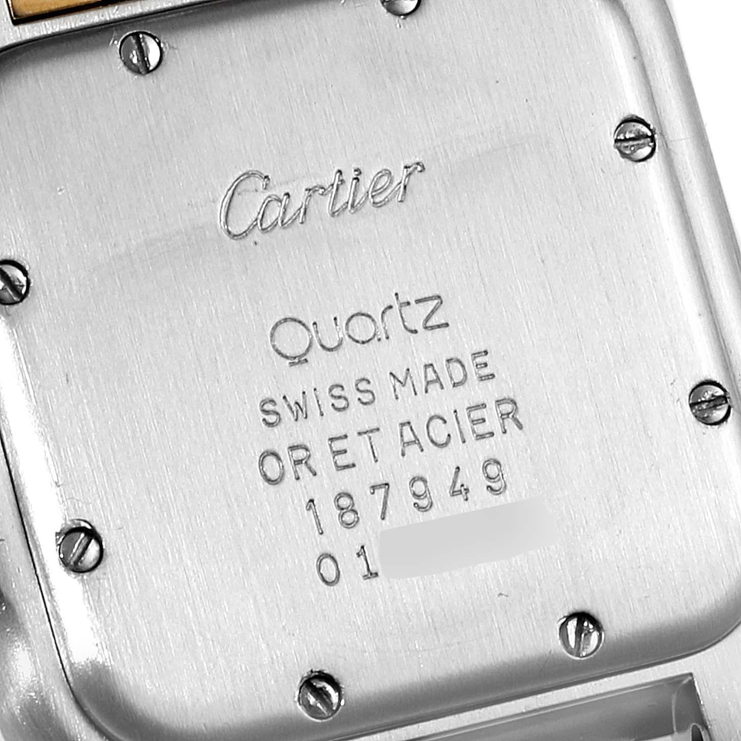 This image shows the back case of a Cartier Panthere W25028B8 Women's Steel and Gold (two tone) Silver Dial W25028B8 Women's Steel and Gold (two tone) Silver Dial Quartz watch at a close-up angle, highlighting the engravings and screws.
