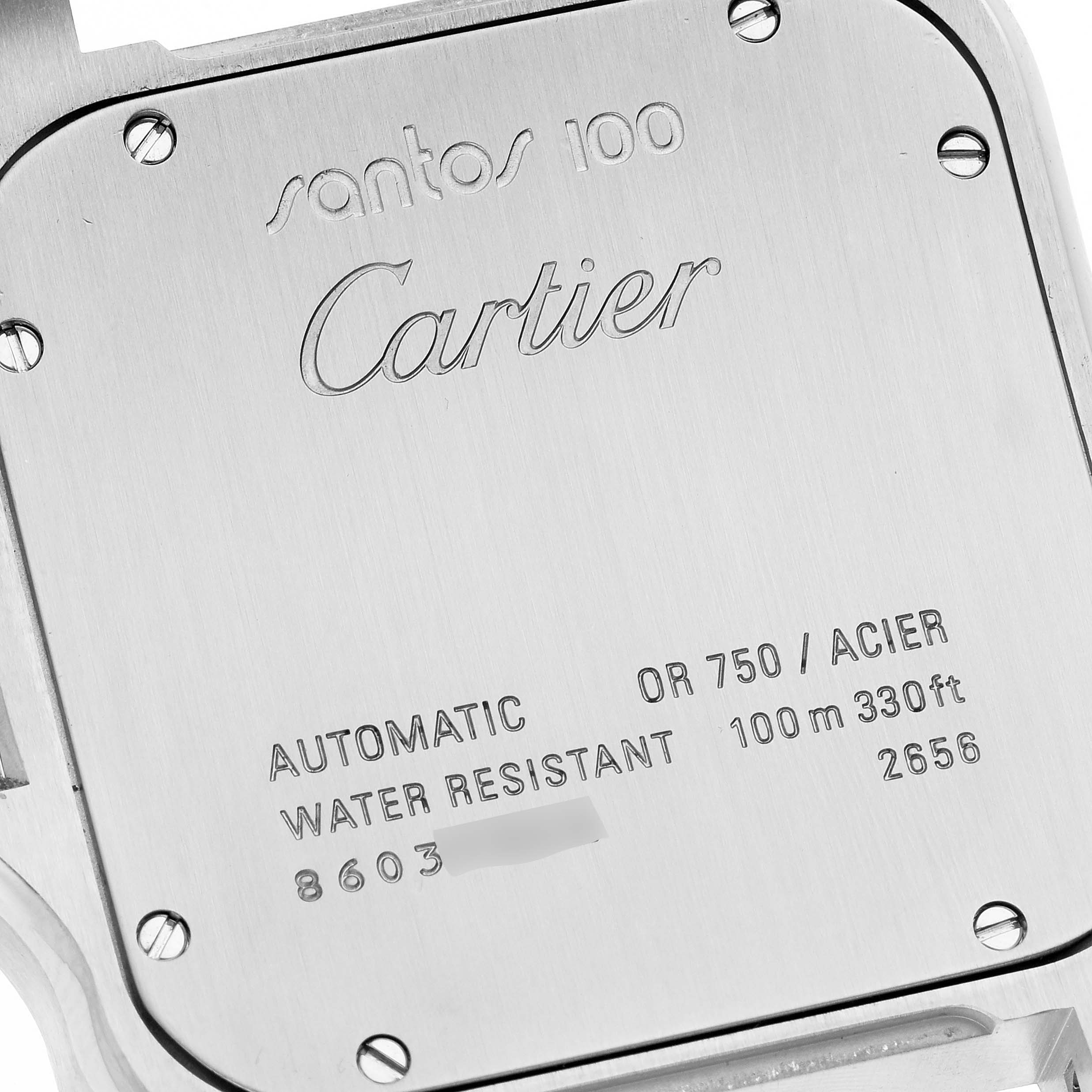 This image shows a close-up of the back case of a Cartier Santos W20072X7 Men
s Steel and Gold (two tone) Silver Dial W20072X7 Men
s Steel and Gold (two tone) Silver Dial 100 model watch.