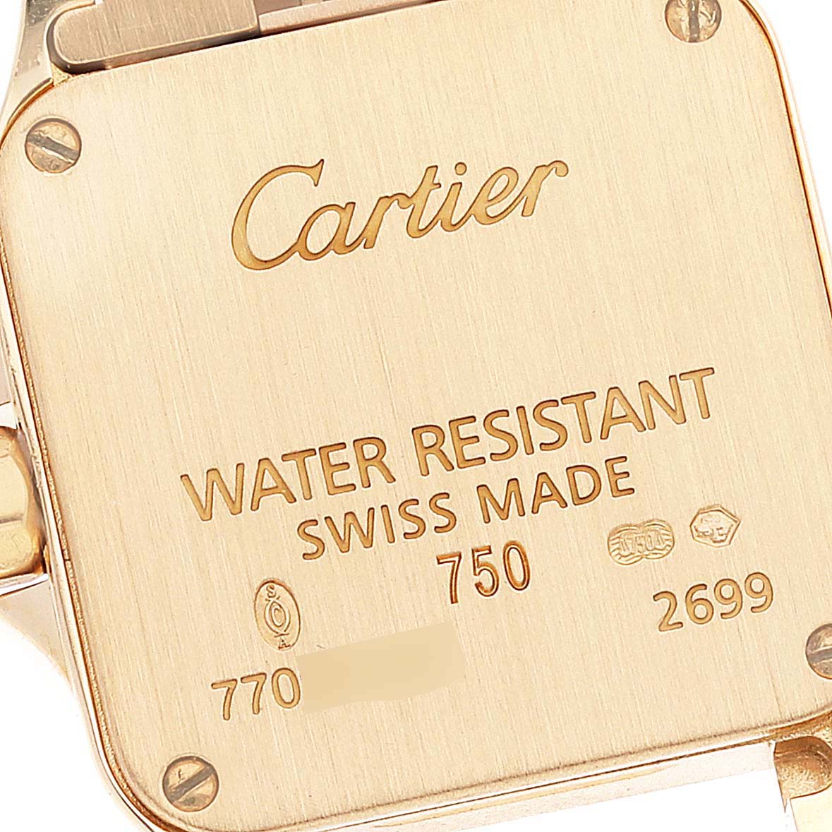 This image shows the back case of the Cartier Santos Demoiselle W25063X9 Women's Yellow Gold Silver Dial W25063X9 Women's Yellow Gold Silver Dial watch, featuring the brand and model's water resistance and Swiss Made markings.