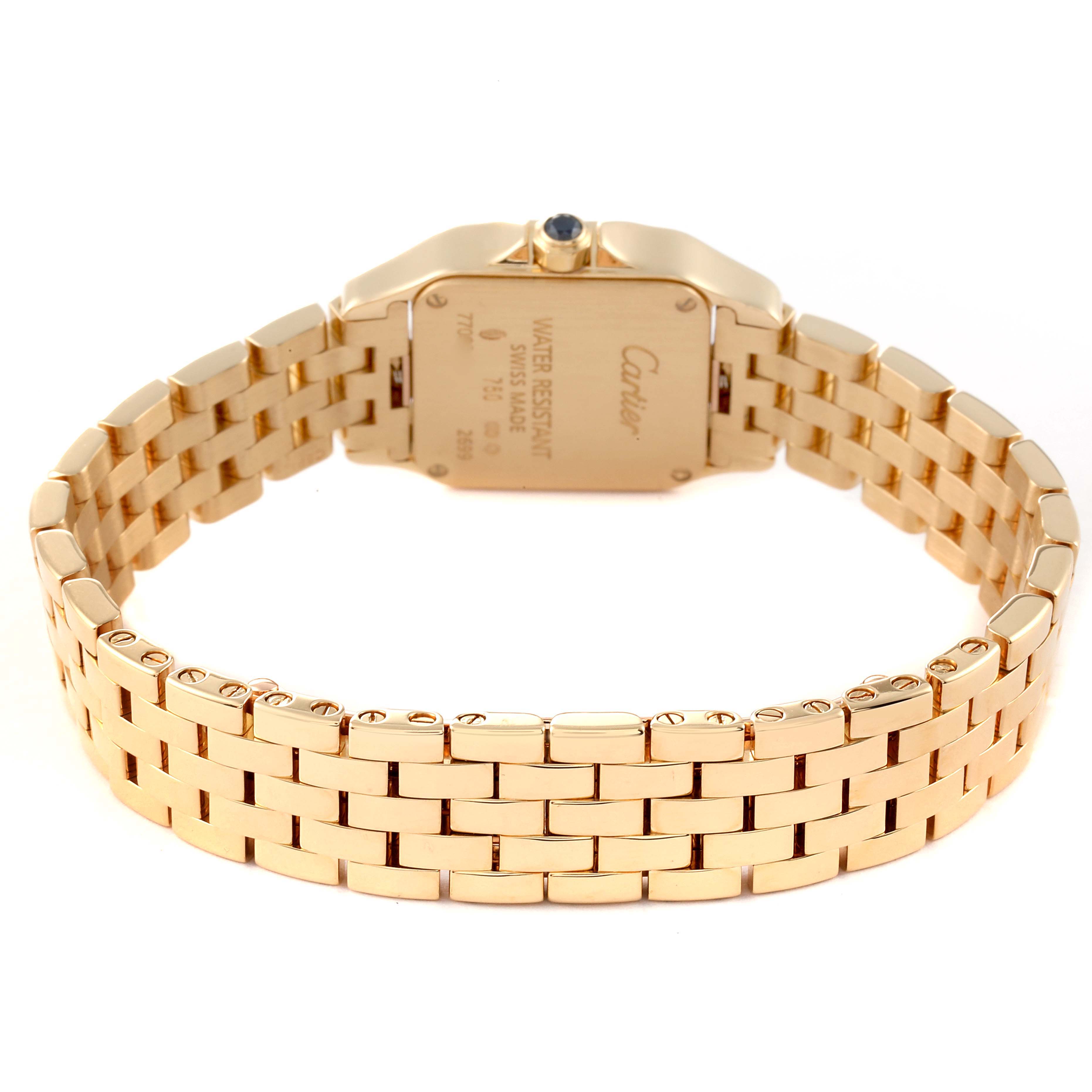 The image shows the back view of a Santos Demoiselle model by Cartier, highlighting its gold bracelet and case back.