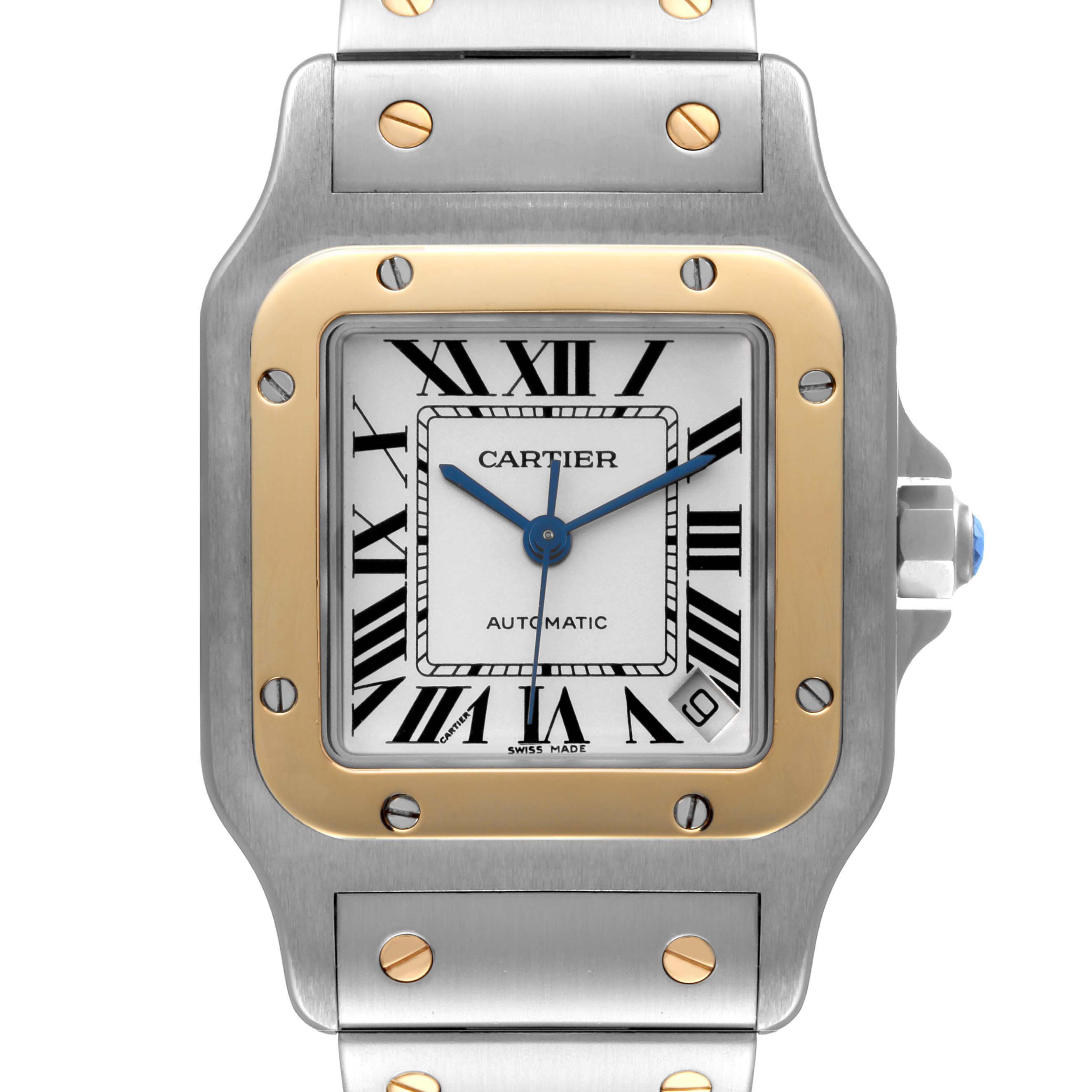 The image shows a front view of the Cartier Santos W20099C4 Men
s Steel and Gold (two tone) Silver Dial W20099C4 Men
s Steel and Gold (two tone) Silver Dial watch, featuring its dial, case, and part of the bracelet.
