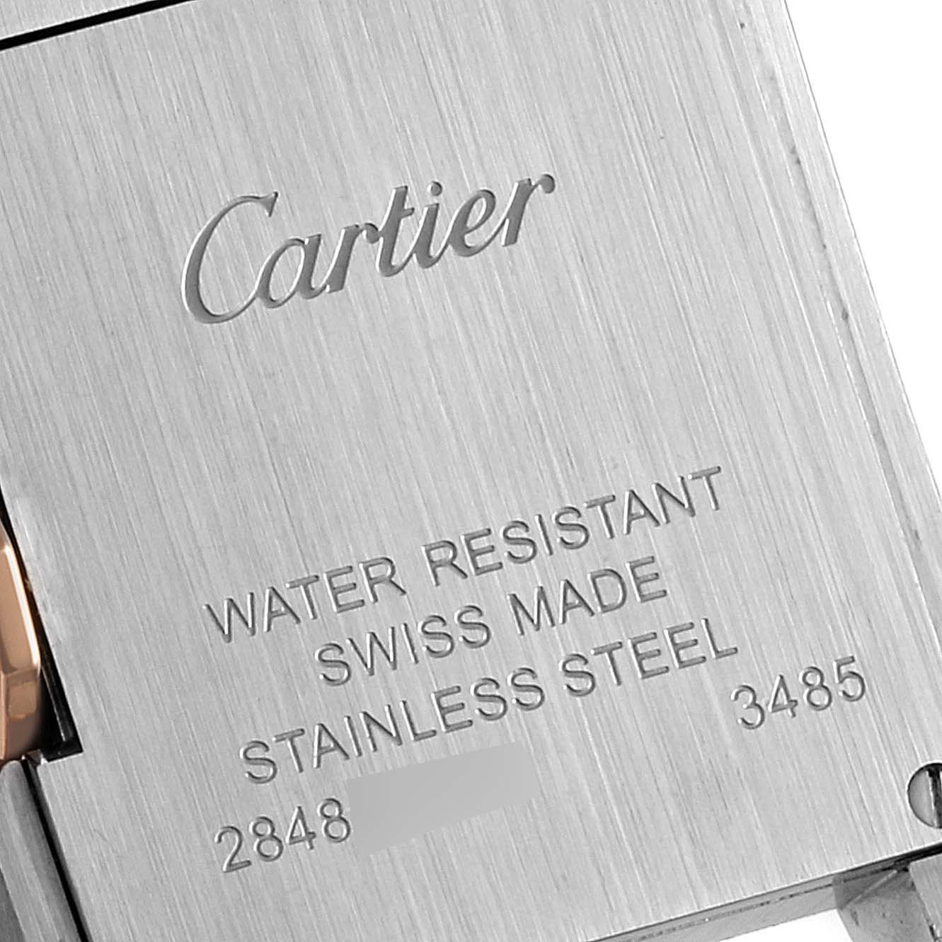 This image shows the stainless steel back of a Cartier Tank Anglaise W5310036 Women
s Steel and Gold (two tone) Silver Dial W5310036 Women
s Steel and Gold (two tone) Silver Dial watch, featuring the brand name and specifications.