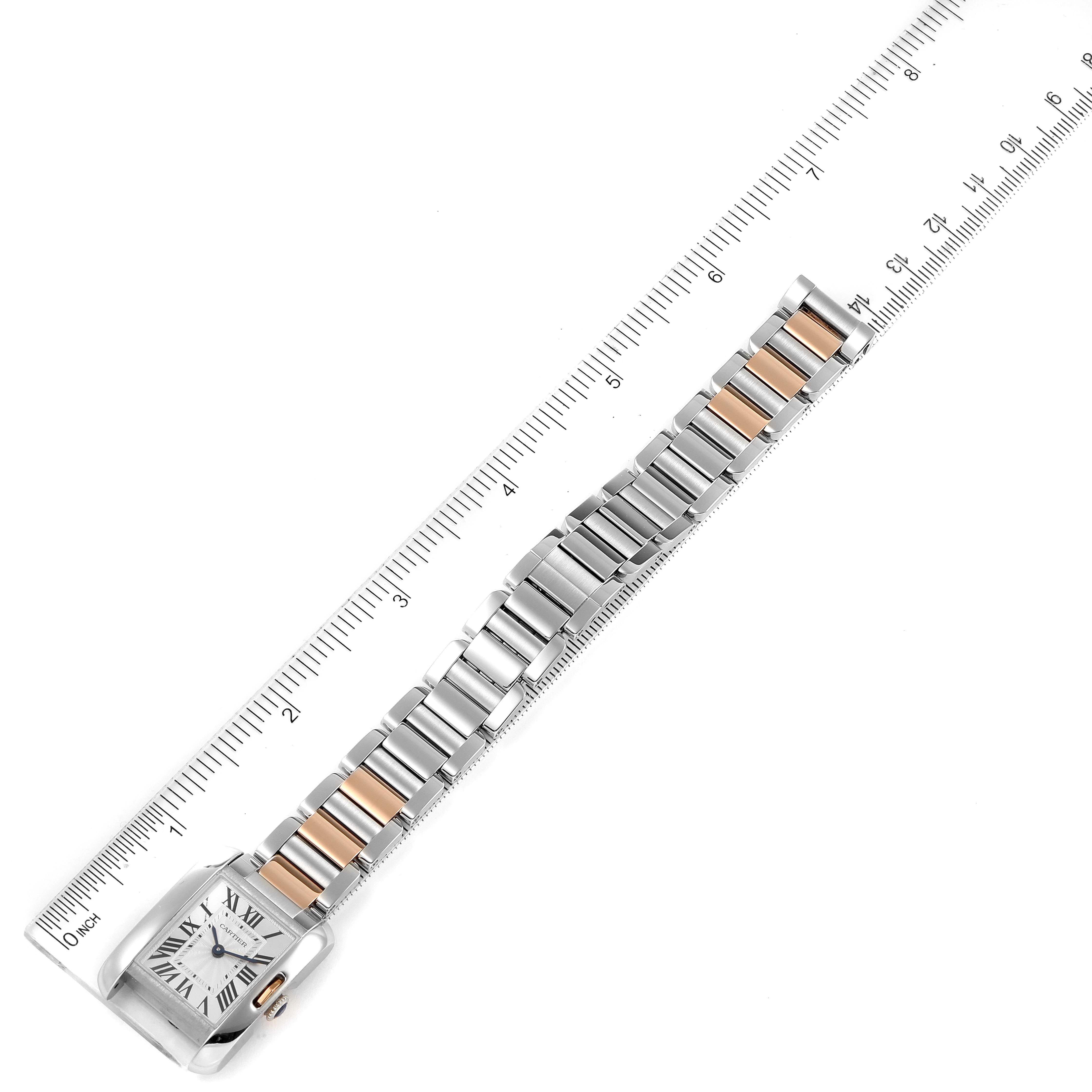 The Cartier Tank Anglaise W5310036 Women
s Steel and Gold (two tone) Silver Dial W5310036 Women
s Steel and Gold (two tone) Silver Dial watch is shown from above, featuring the face and full bracelet, with a ruler for scale.
