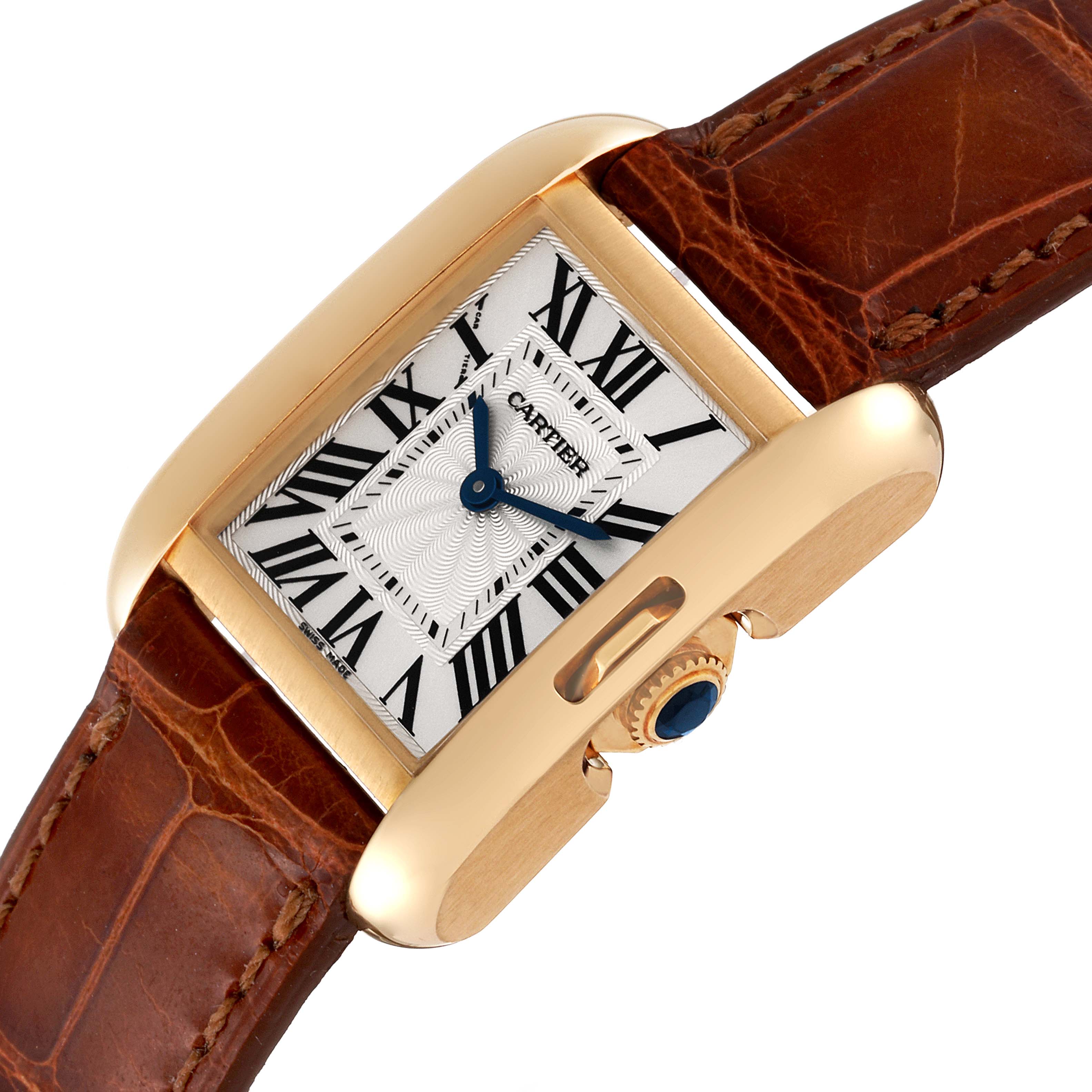 This image shows a close-up, angled side view of the Cartier Tank Anglaise W5310028 Women's Yellow Gold Silver Dial W5310028 Women's Yellow Gold Silver Dial watch face, bezel, crown, and leather strap.