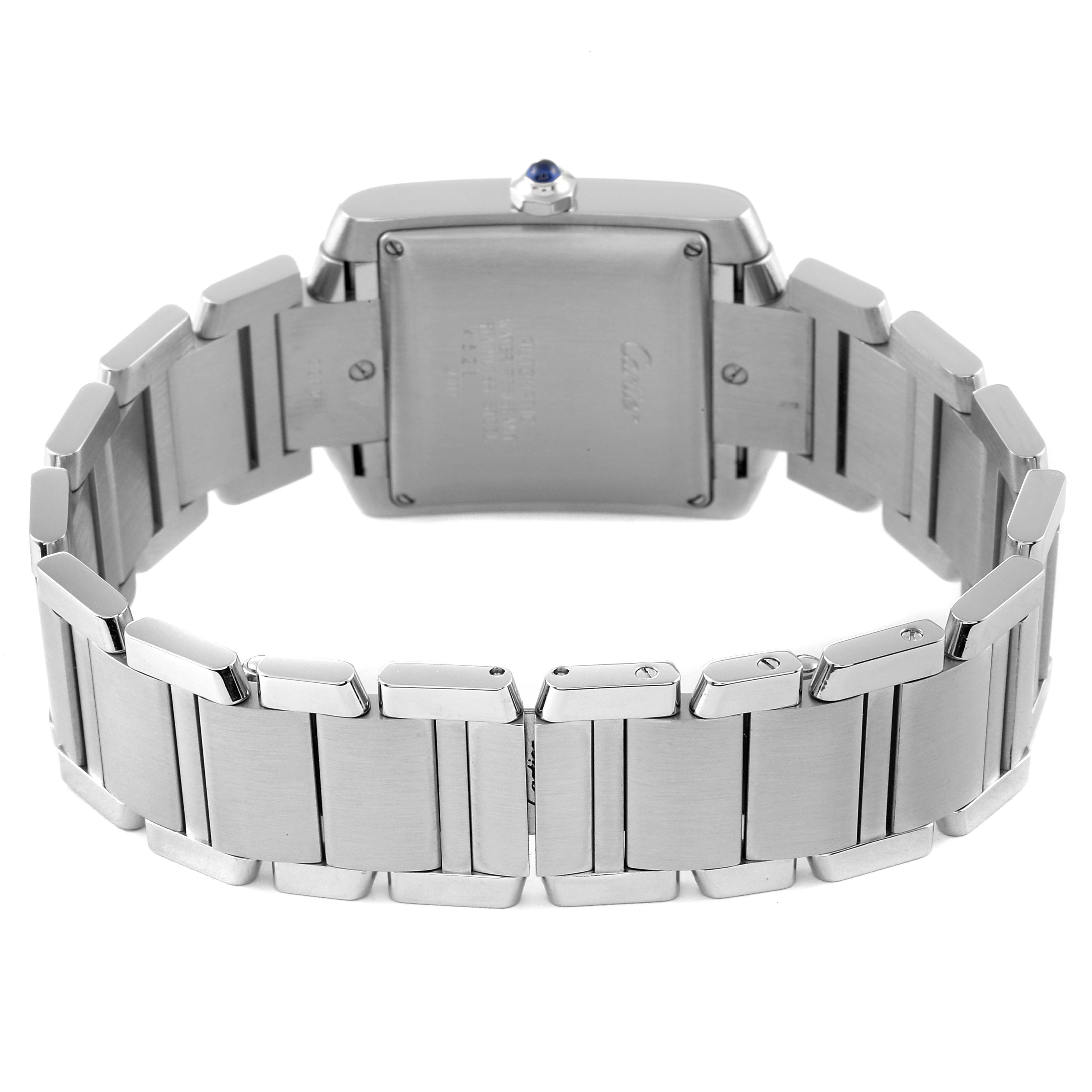 The image shows the back view of a Cartier Tank Francaise W51002Q3 Men's Stainless Steel Silver Dial W51002Q3 Men's Stainless Steel Silver Dial watch, highlighting the case back and stainless steel bracelet.
